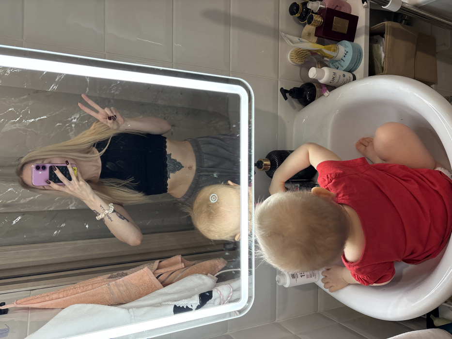 Mother, baby share quiet domestic moments in Khimki home