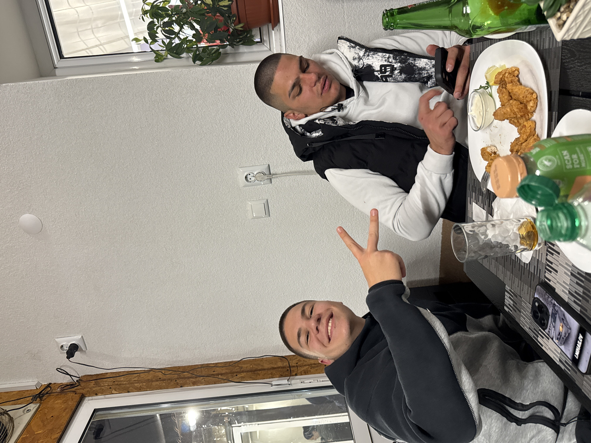 Young men dine at restaurant in Momina Klisura, Bulgaria