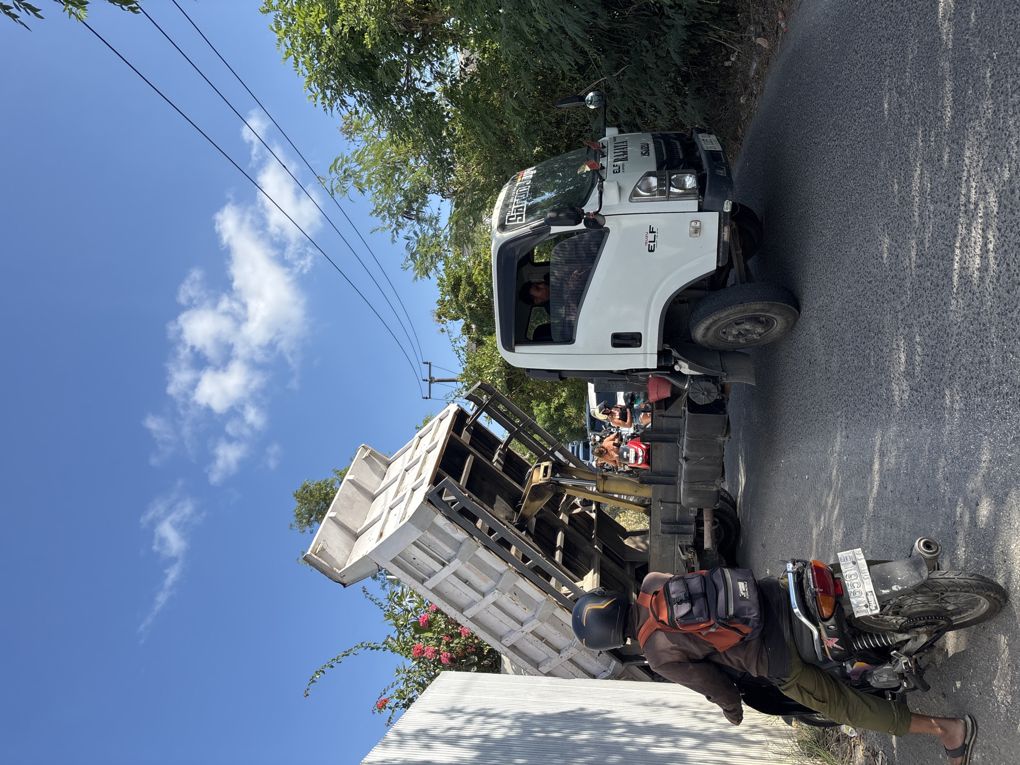 Dump truck blocks narrow road in Kuta Selatan, Bali