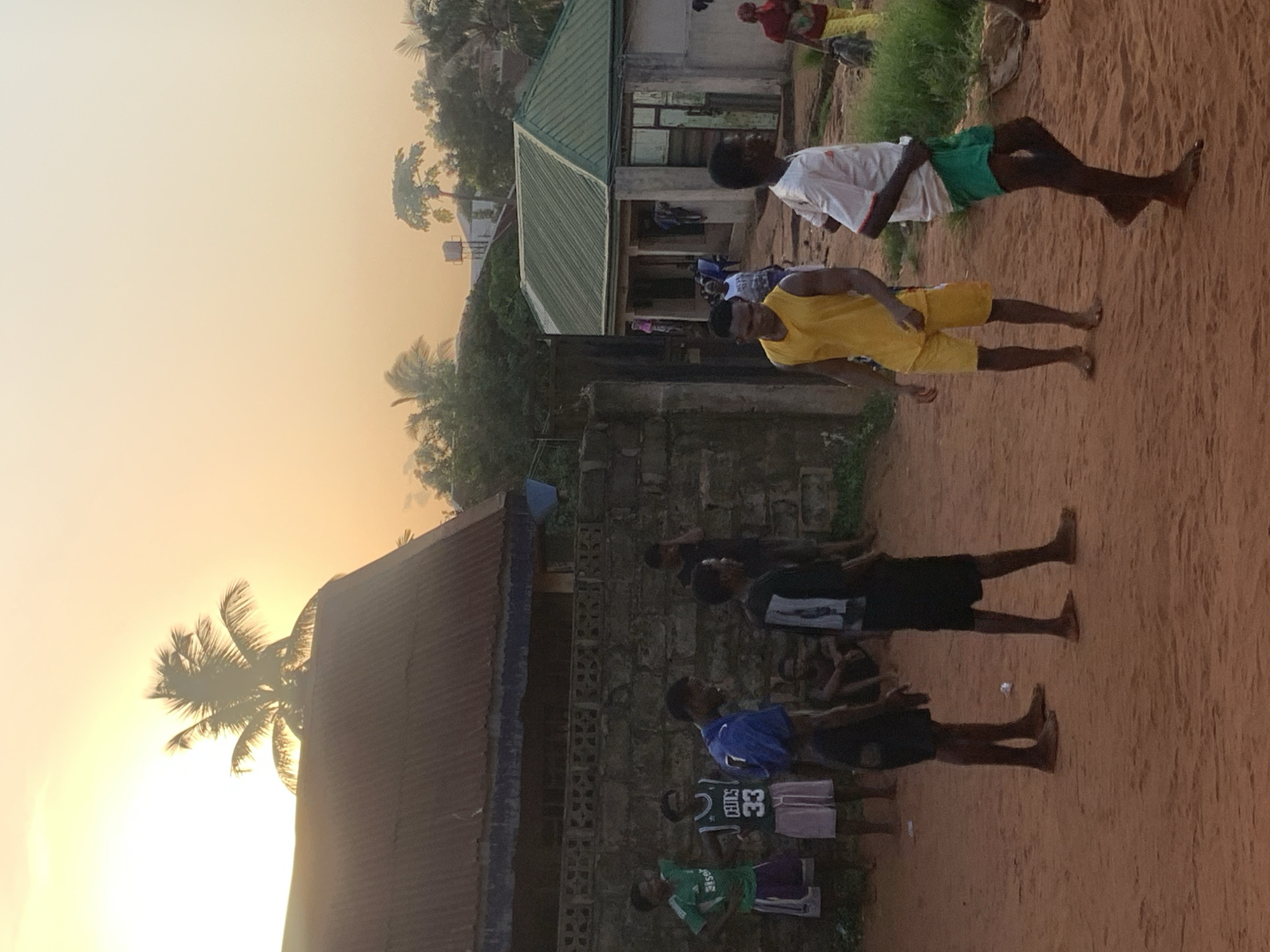 Young men play casual soccer in Nigerian village