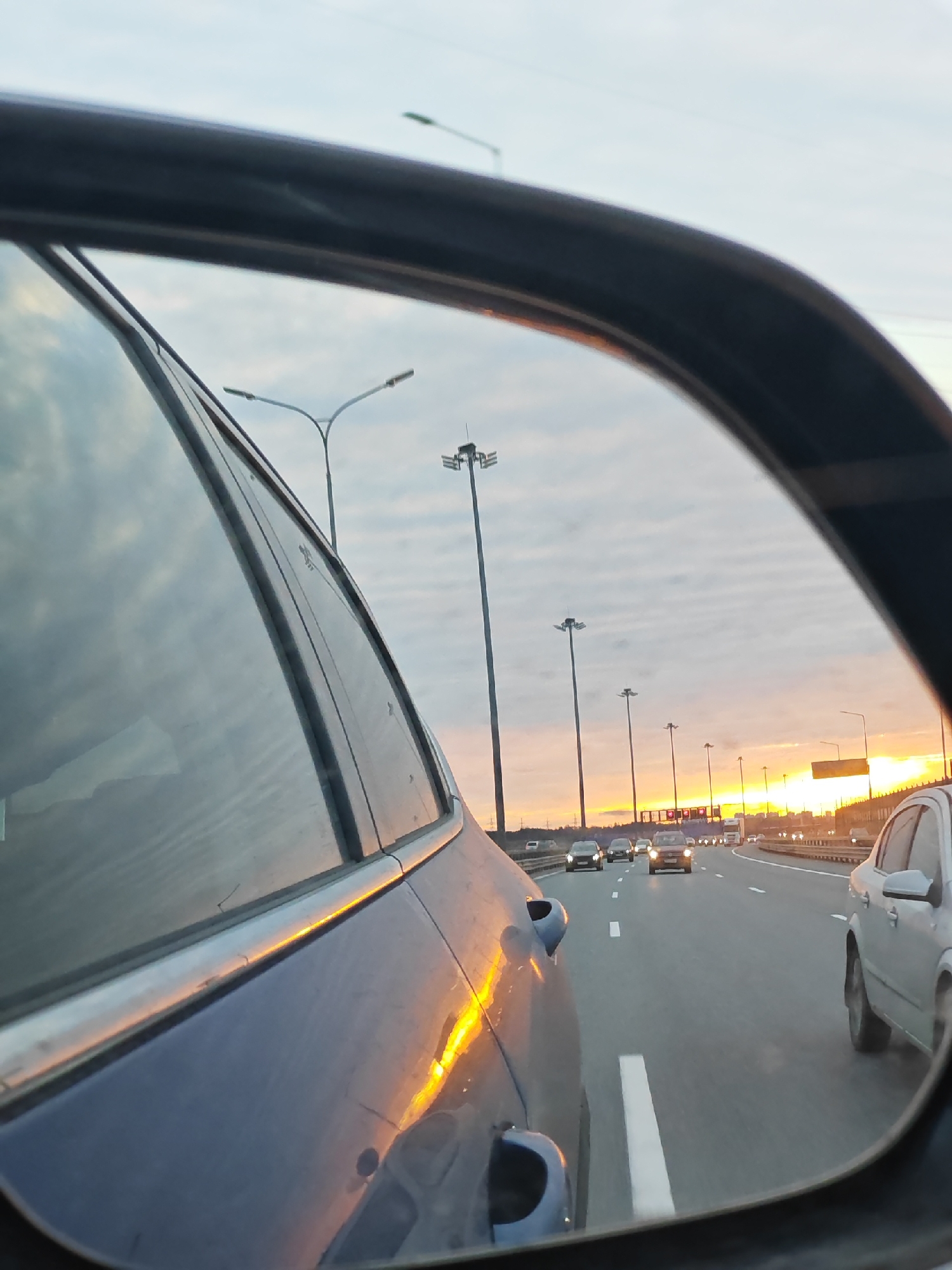 Sunset highway scene captured near Poroshkino, Russia