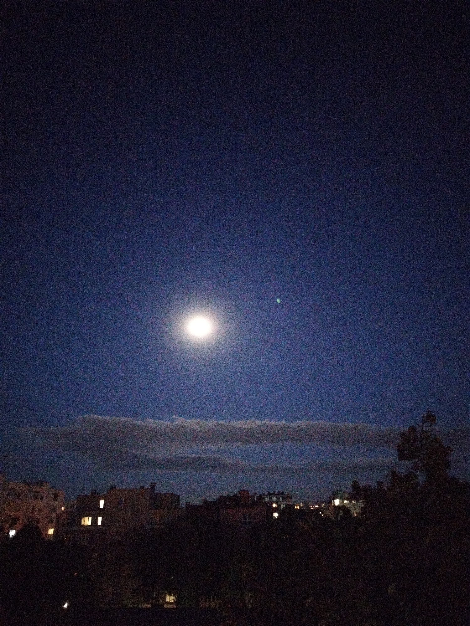 Evening moments captured across Sofia: moon, studies, yellow building