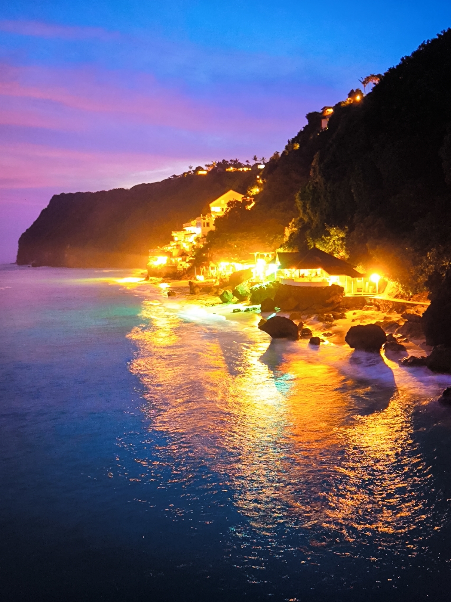 Coastal entertainment complex captured at twilight by witnesses