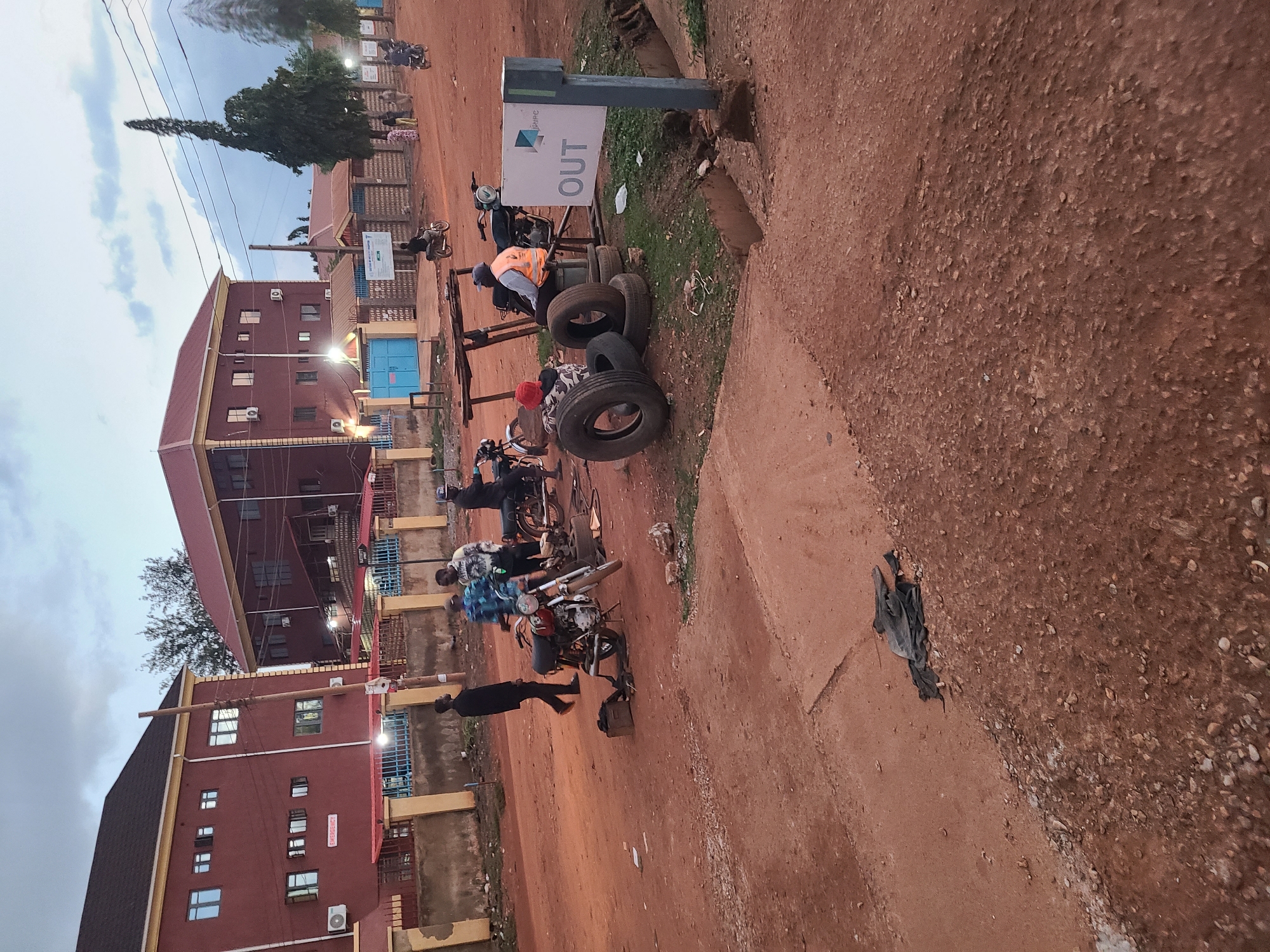 Everyday street life around a busy Abuja neighborhood