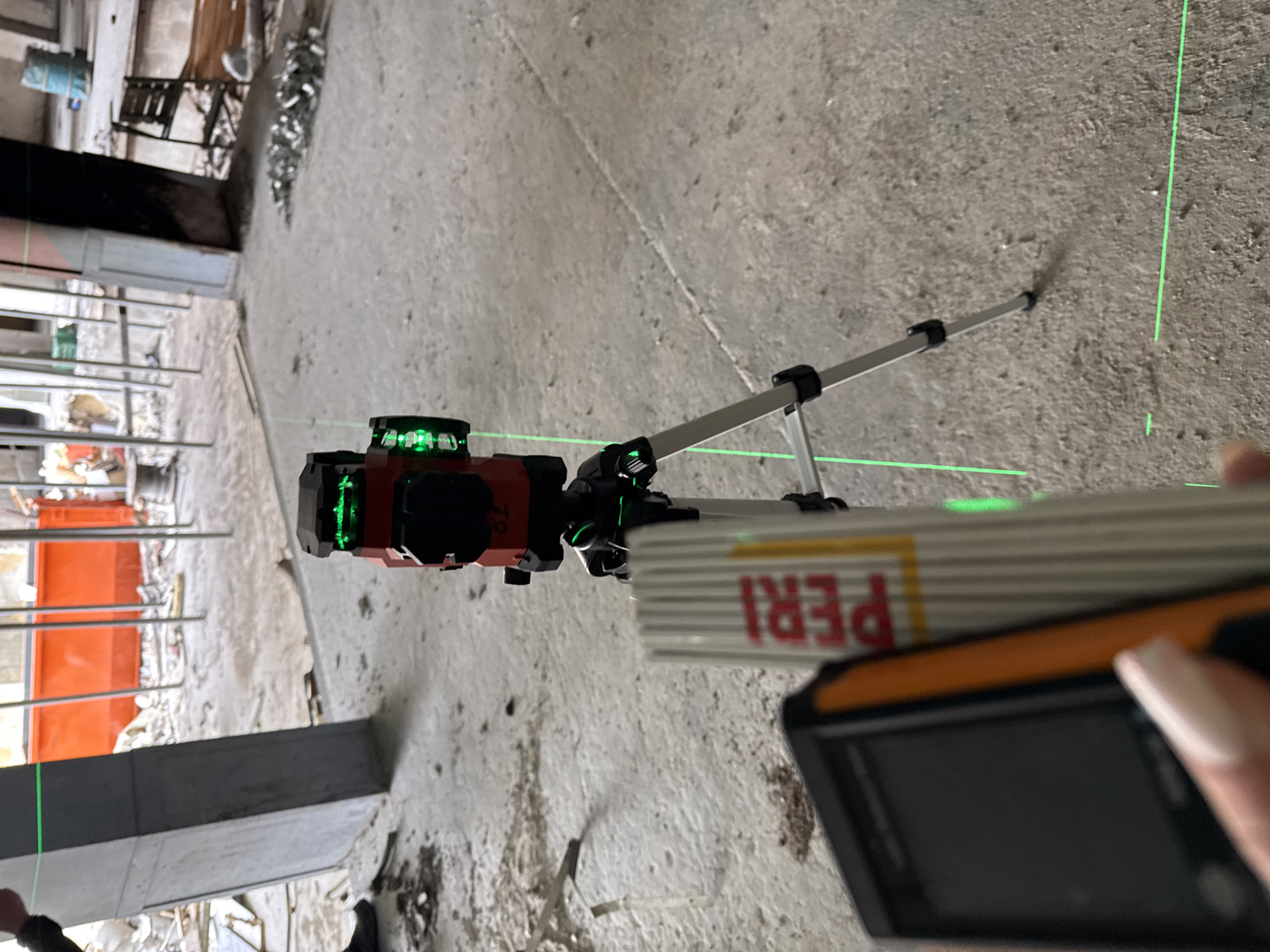 Construction site with laser surveying and elevator shaft documented