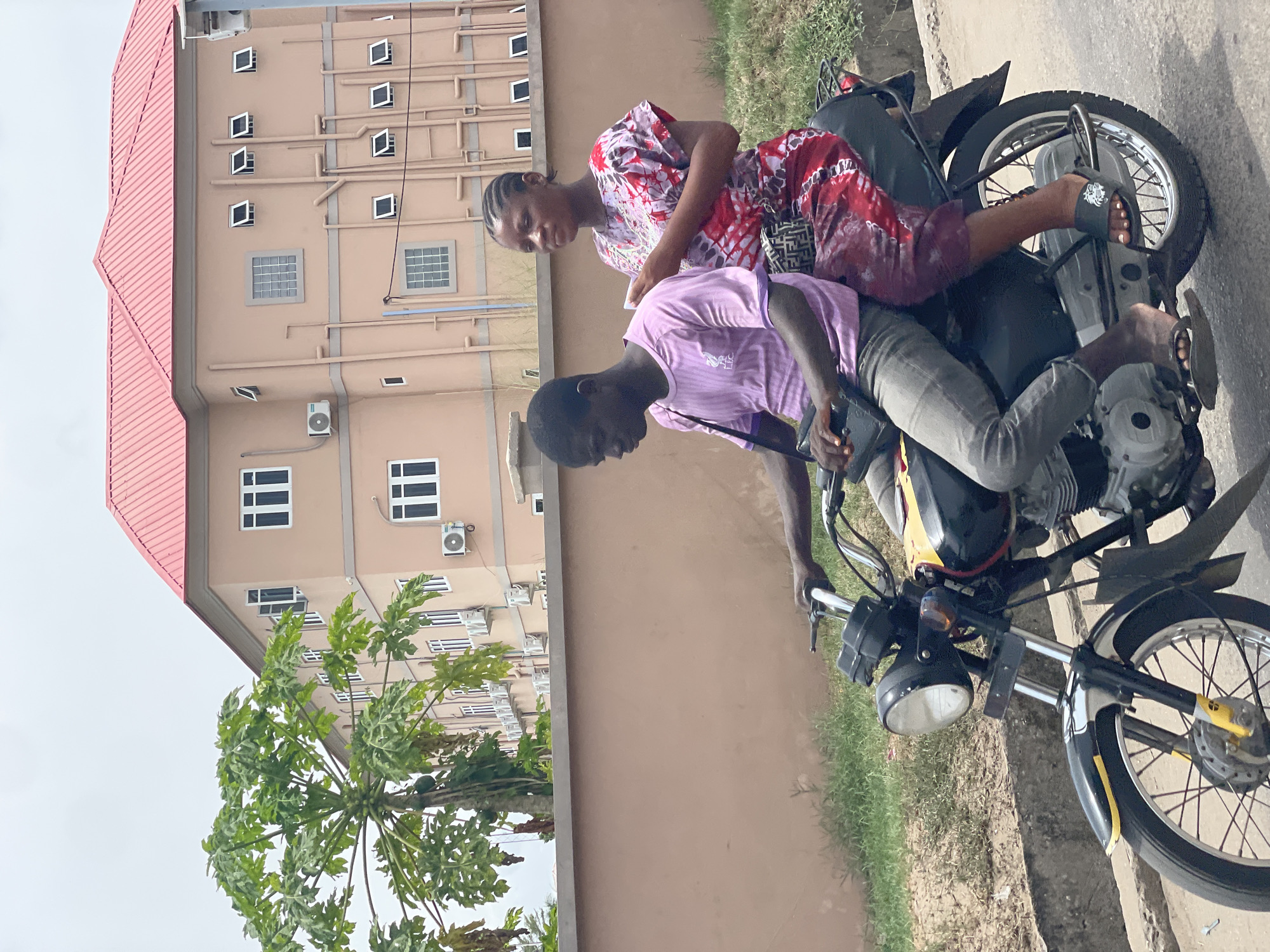 Motorcycle riders spotted on Badagry street near university signage
