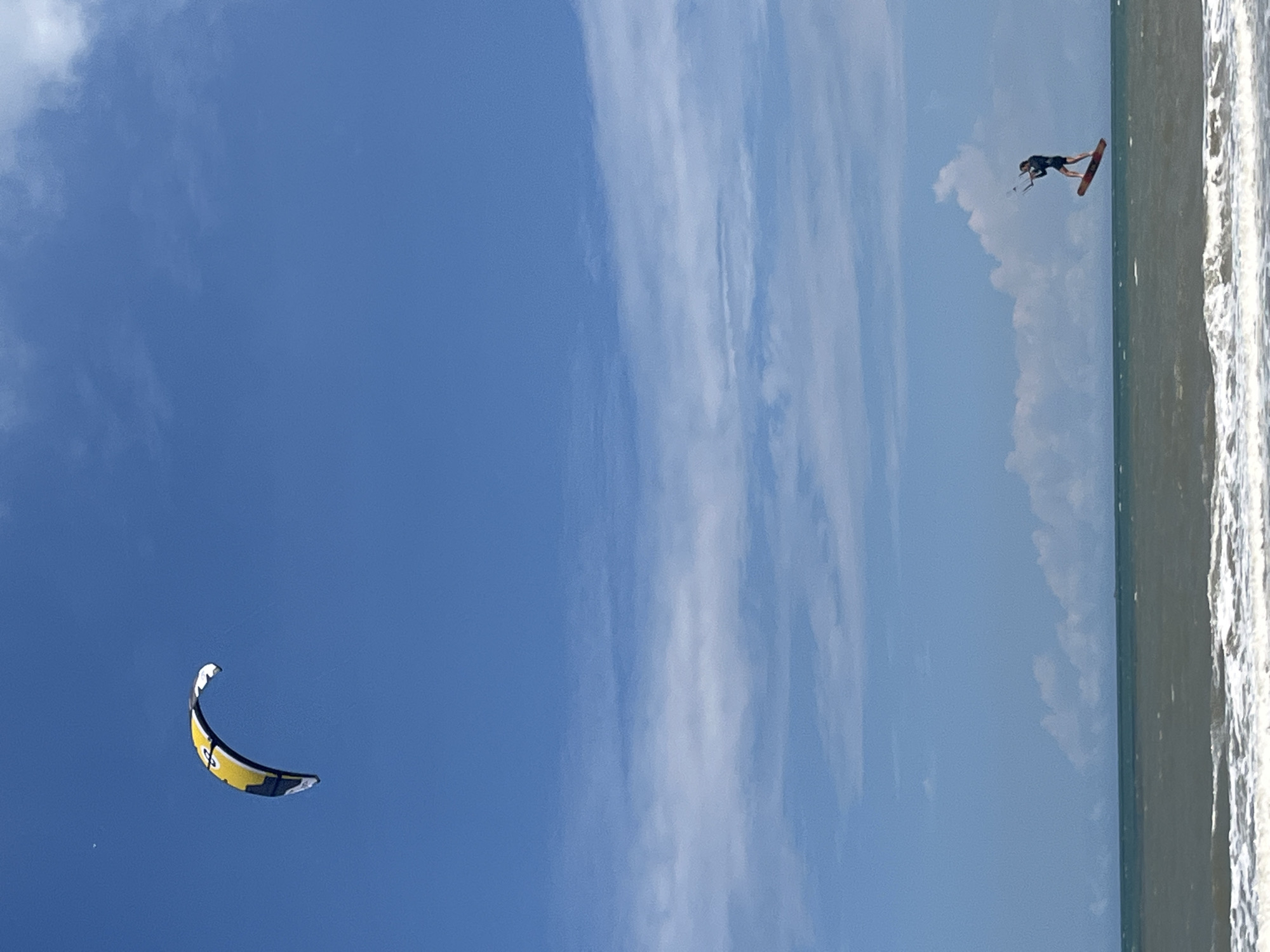 Kitesurfing session on a sunny Phan Thiết beach