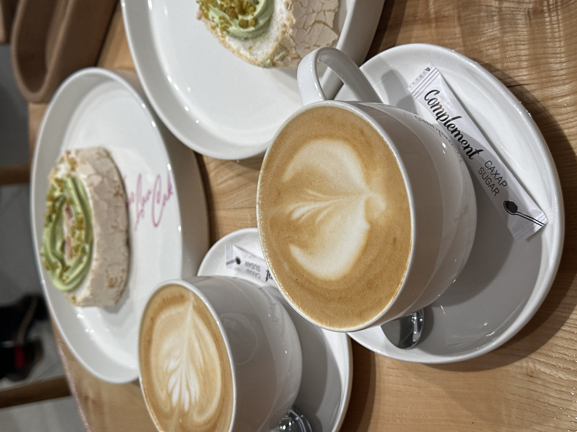 Cafe customers enjoy lattes and pistachio desserts in Rostov-on-Don