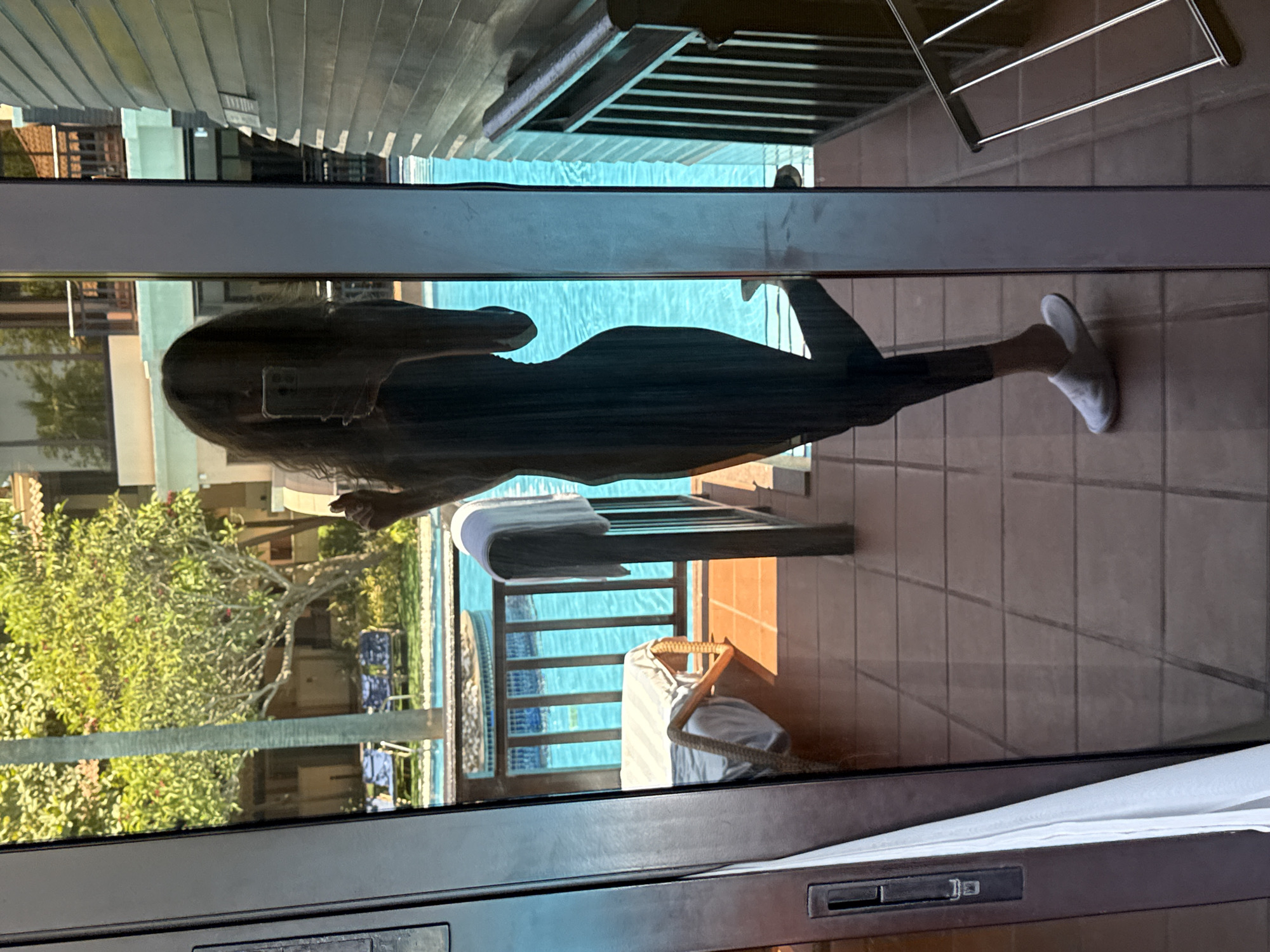 Woman Takes Multiple Mirror Selfies at Dubai Resort Pool