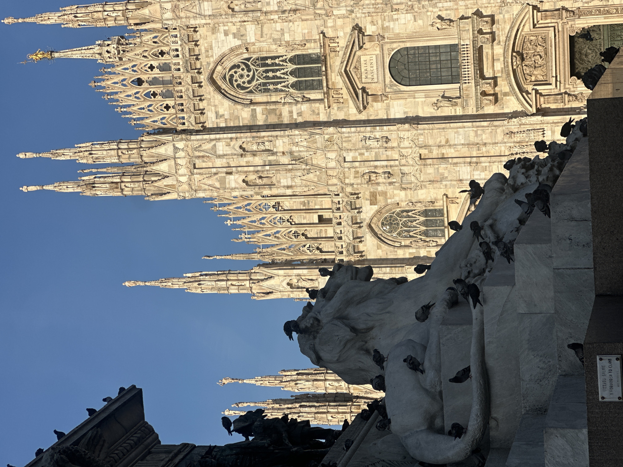 Piazza del Duomo on a clear July afternoon in Milan