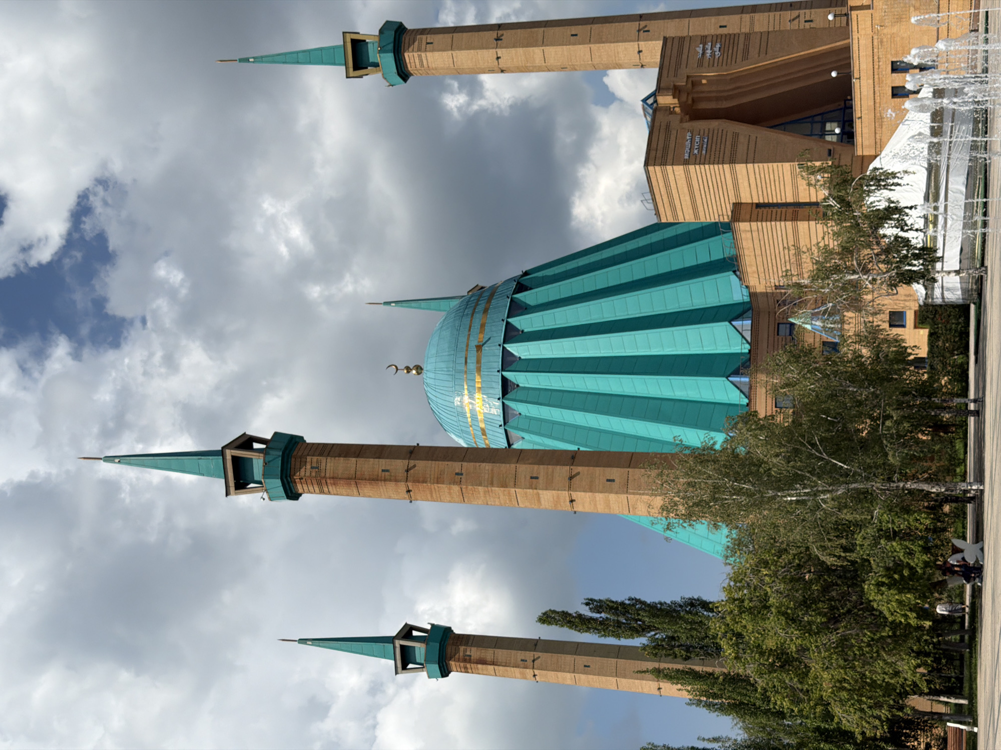 Masyhyr Mosque's teal minarets rise over Pavlodar, Kazakhstan