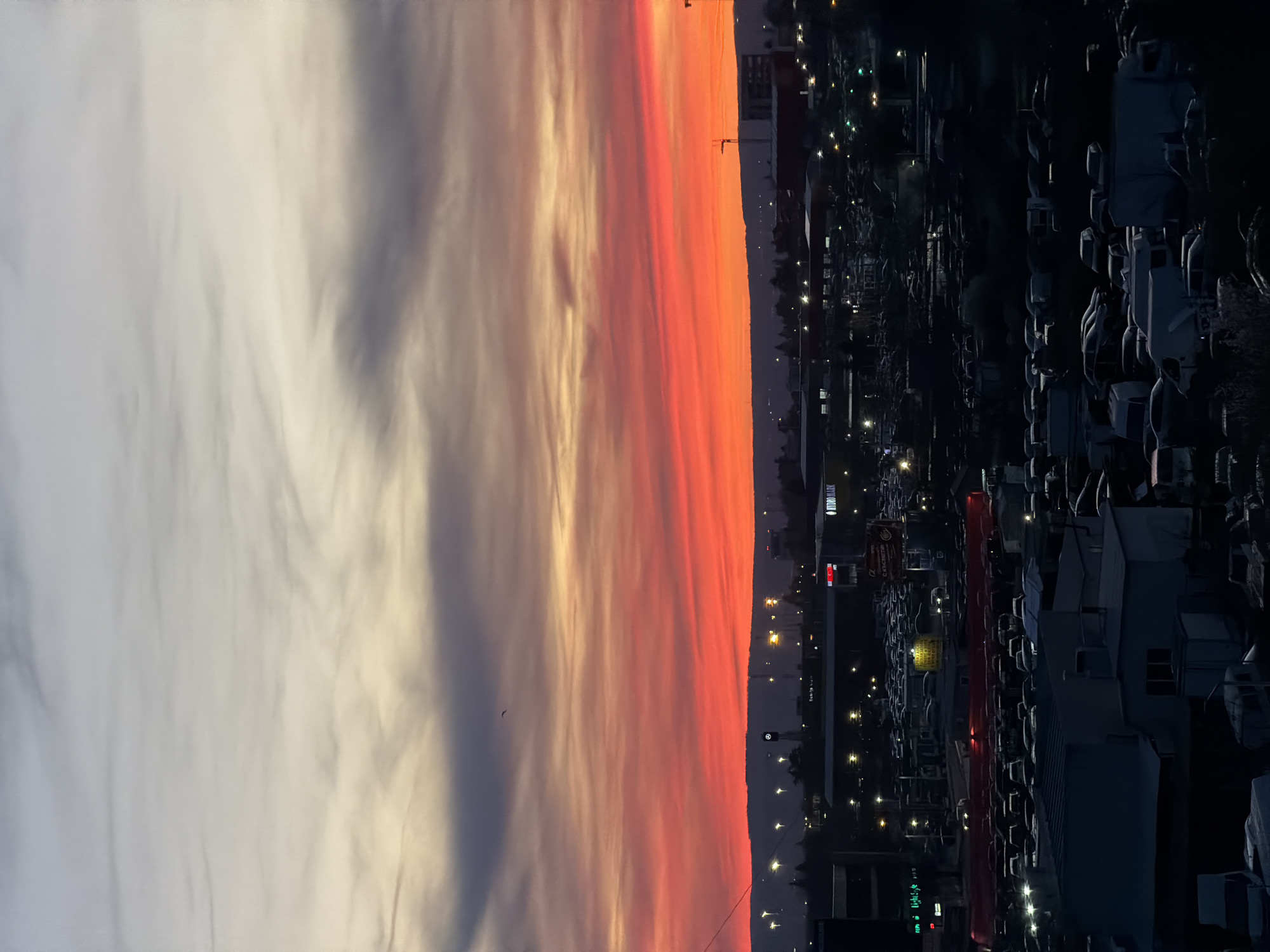 Vibrant sunset captured over Varna, Bulgaria from elevated position