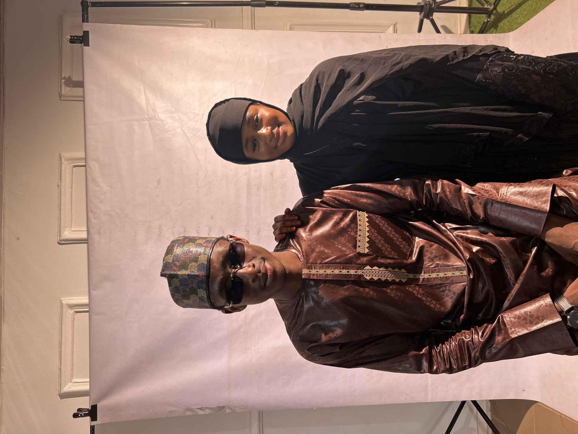Portrait photography sessions documented at makeshift studio in Jos