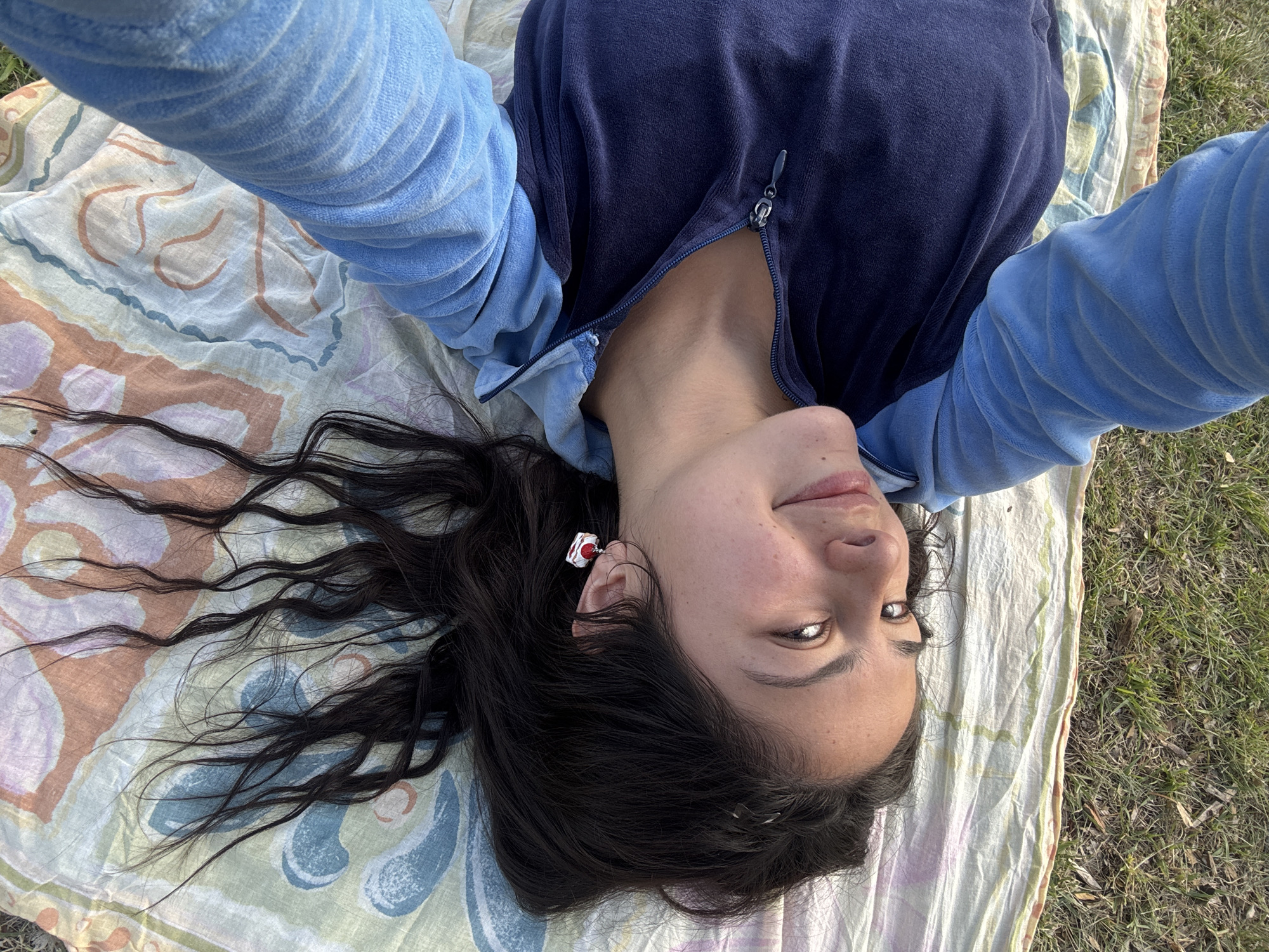 Woman takes relaxed outdoor selfie in Como, Australia