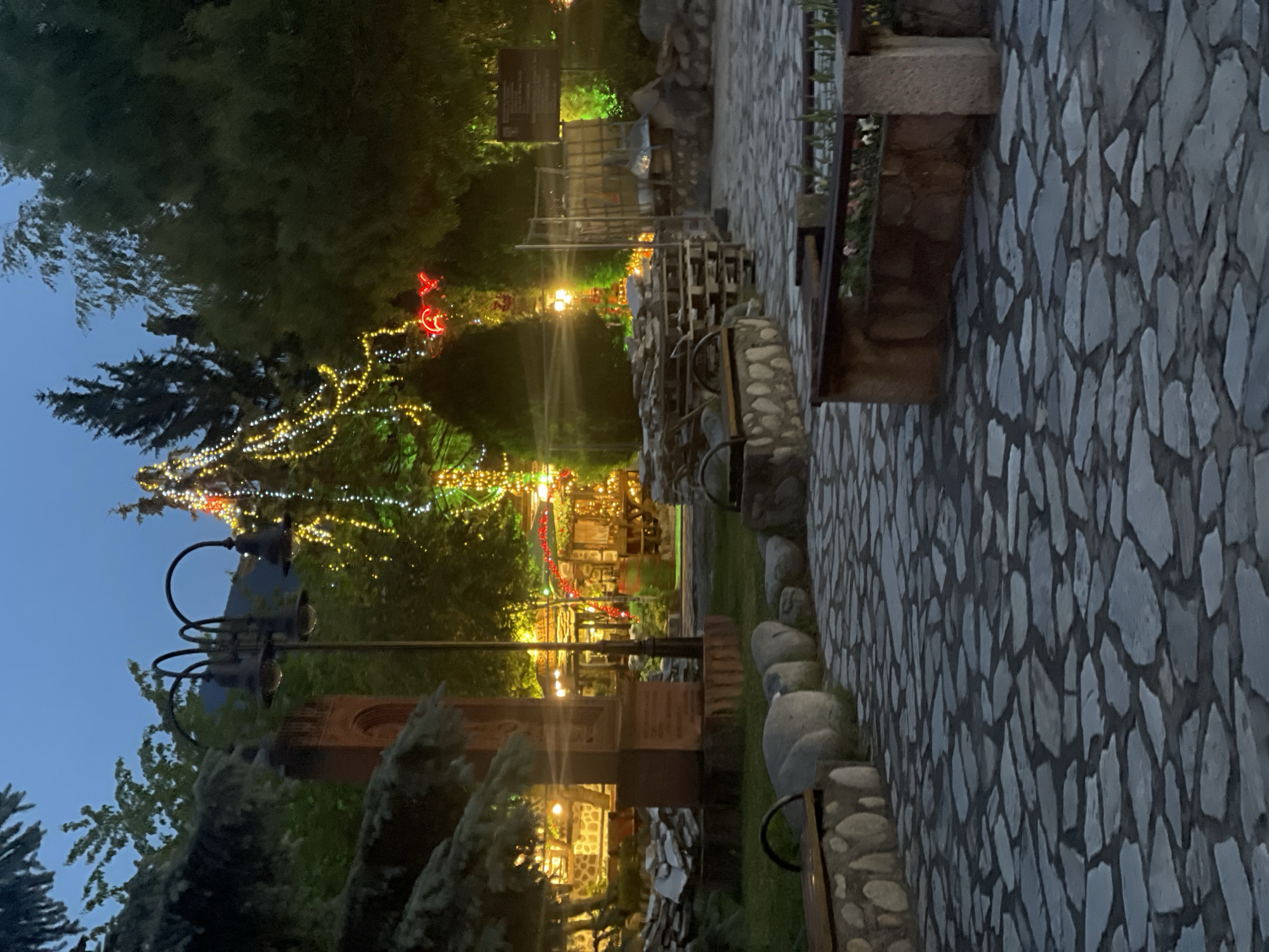 Evening illumination observed at outdoor dining establishment