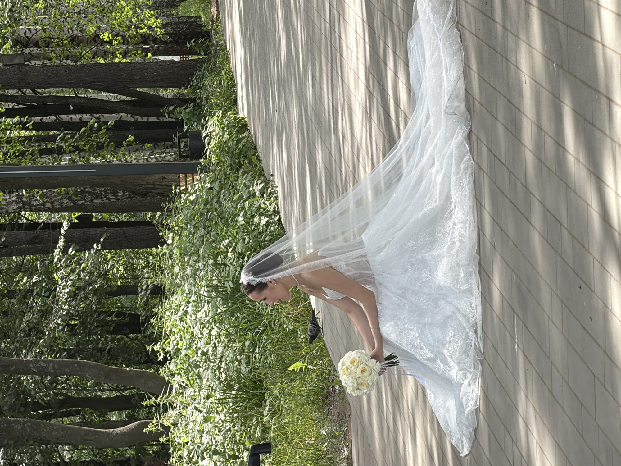Wedding day portraits in a Chaikovsky park, summer morning