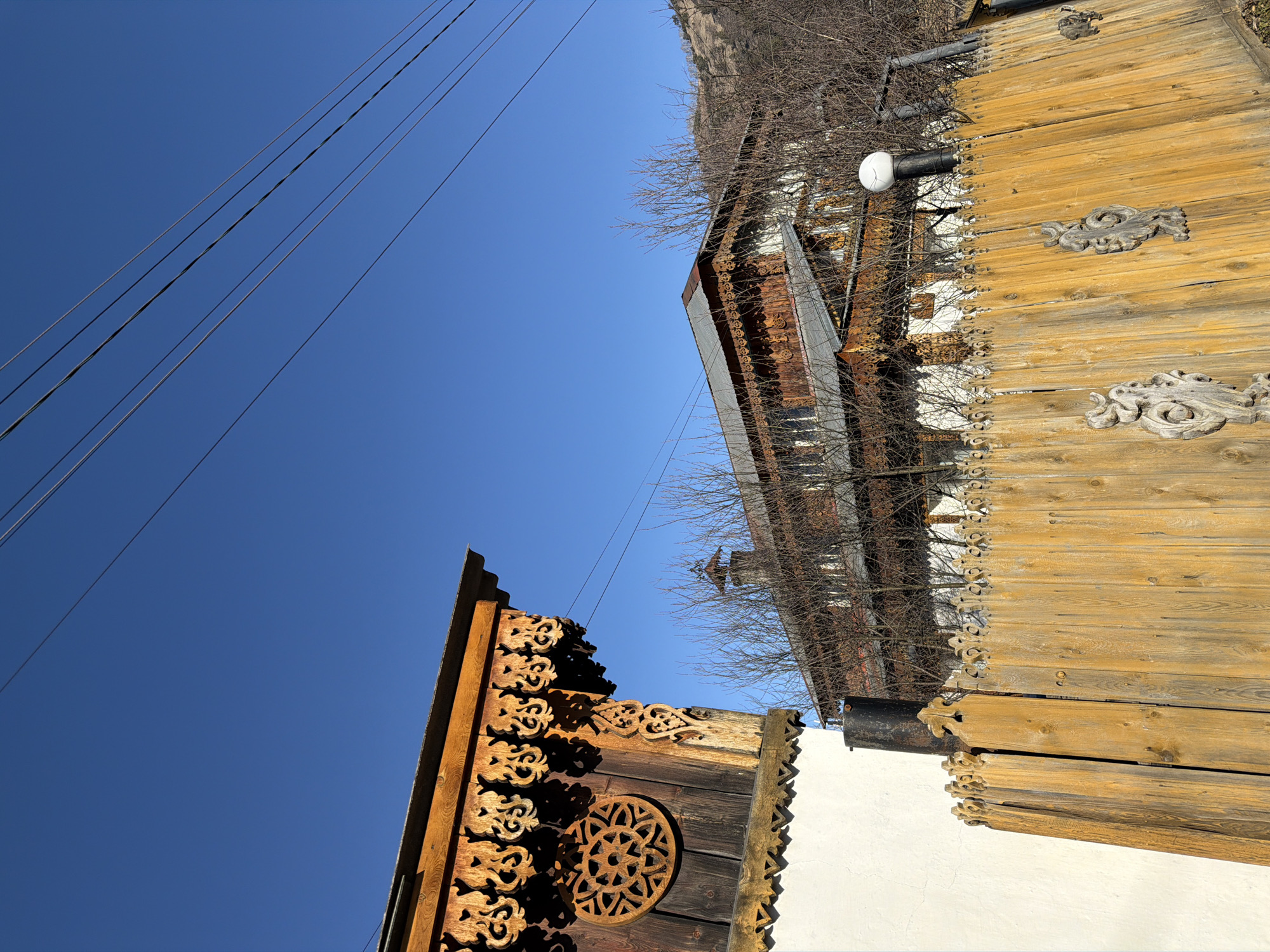 Traditional wooden architecture documented in Manzherok, Russia
