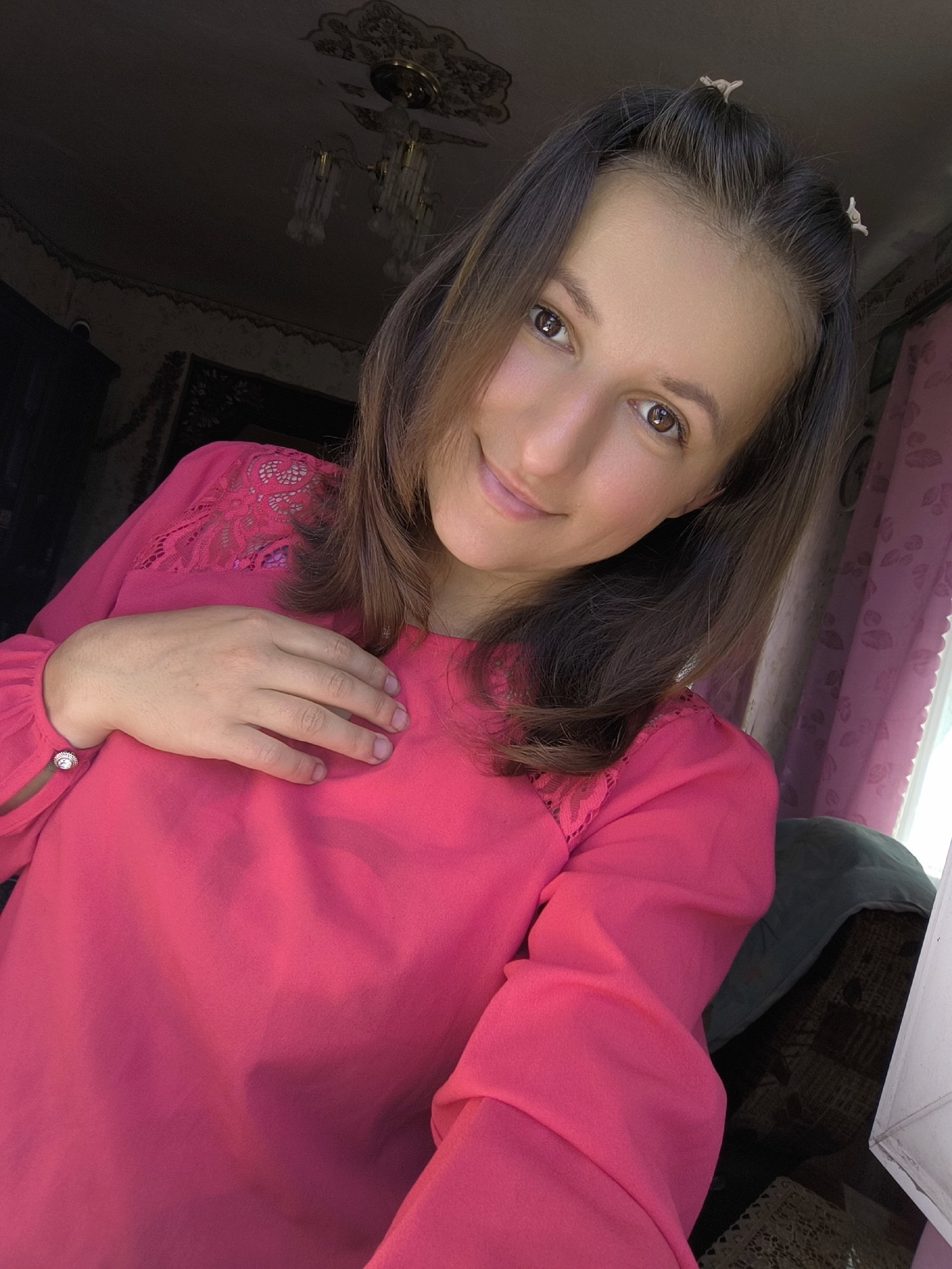 Back-to-back selfies in Anastasivka, pink top and hair clips
