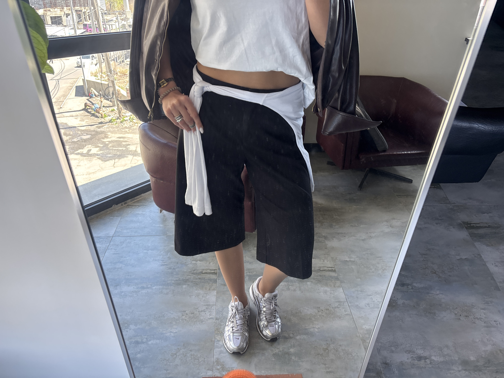 Person takes casual mirror selfie in Zovuni, Armenia