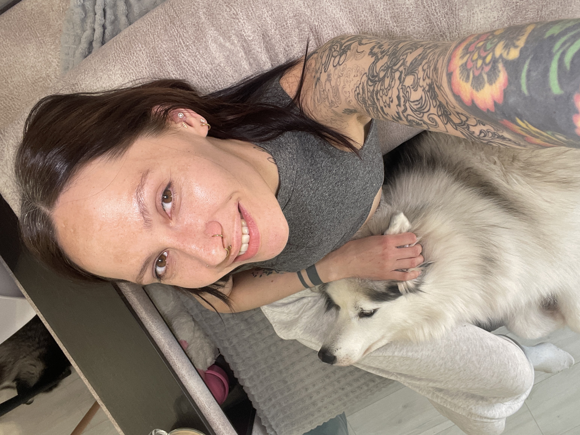 Woman takes selfie with husky dog in Izhevsk