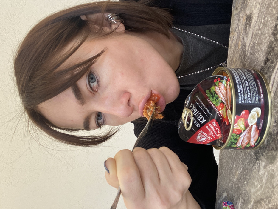Morning breakfast selfies with canned fish in Ust-Ilimsk