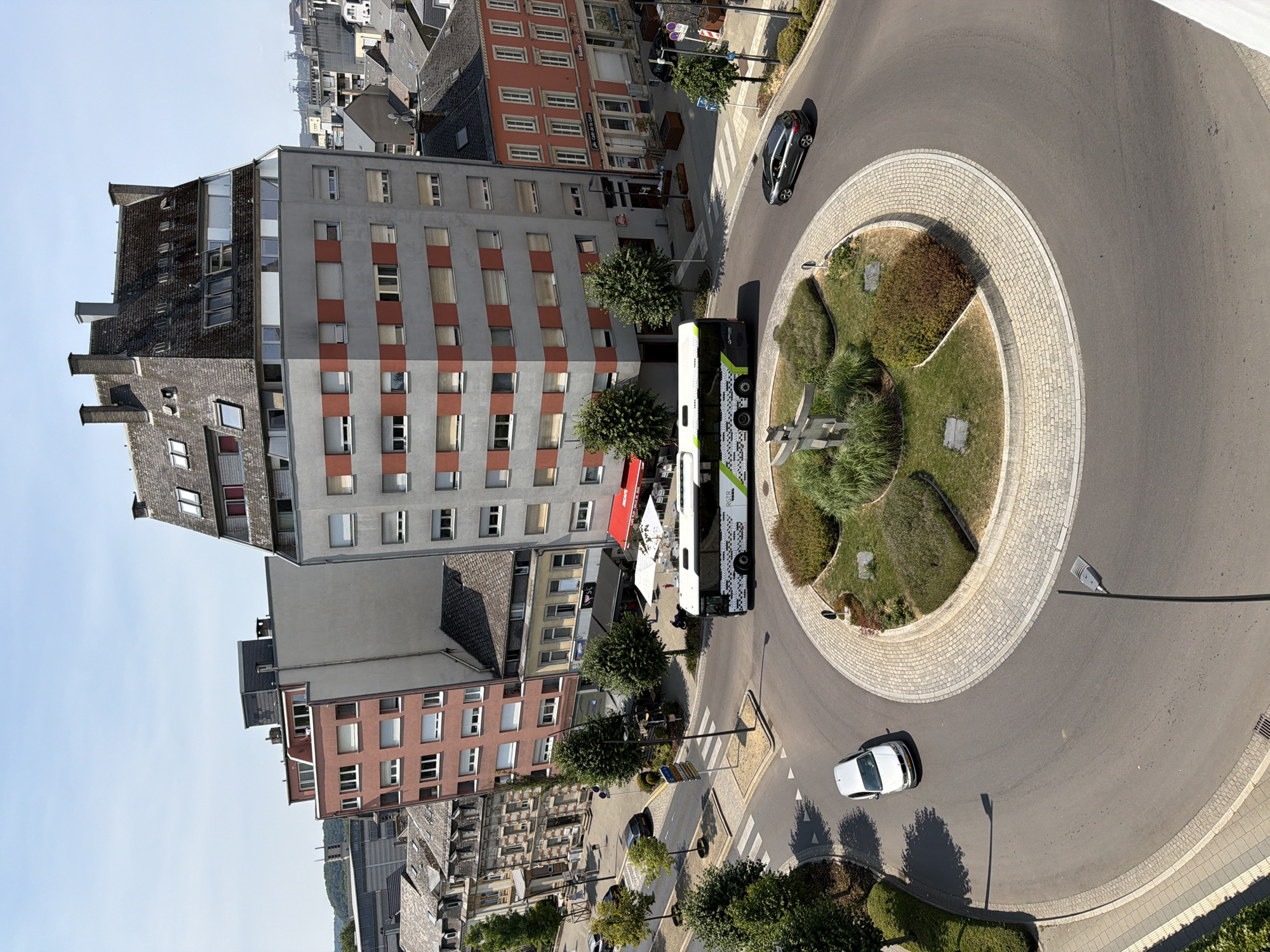 Around a red pedestrian bridge in sunny Esch-sur-Alzette