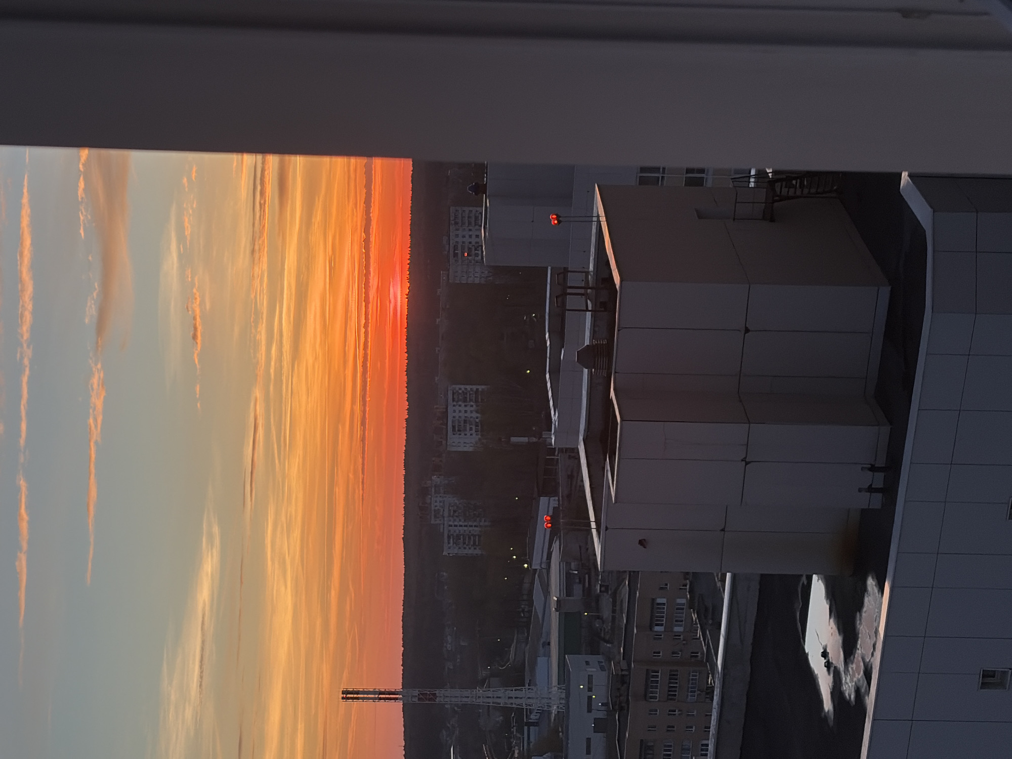 Sunset captured from Moscow high-rise building window