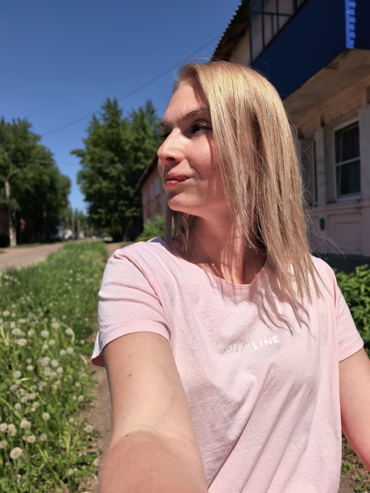 Woman in pink documented during morning walk in Sterlitamak
