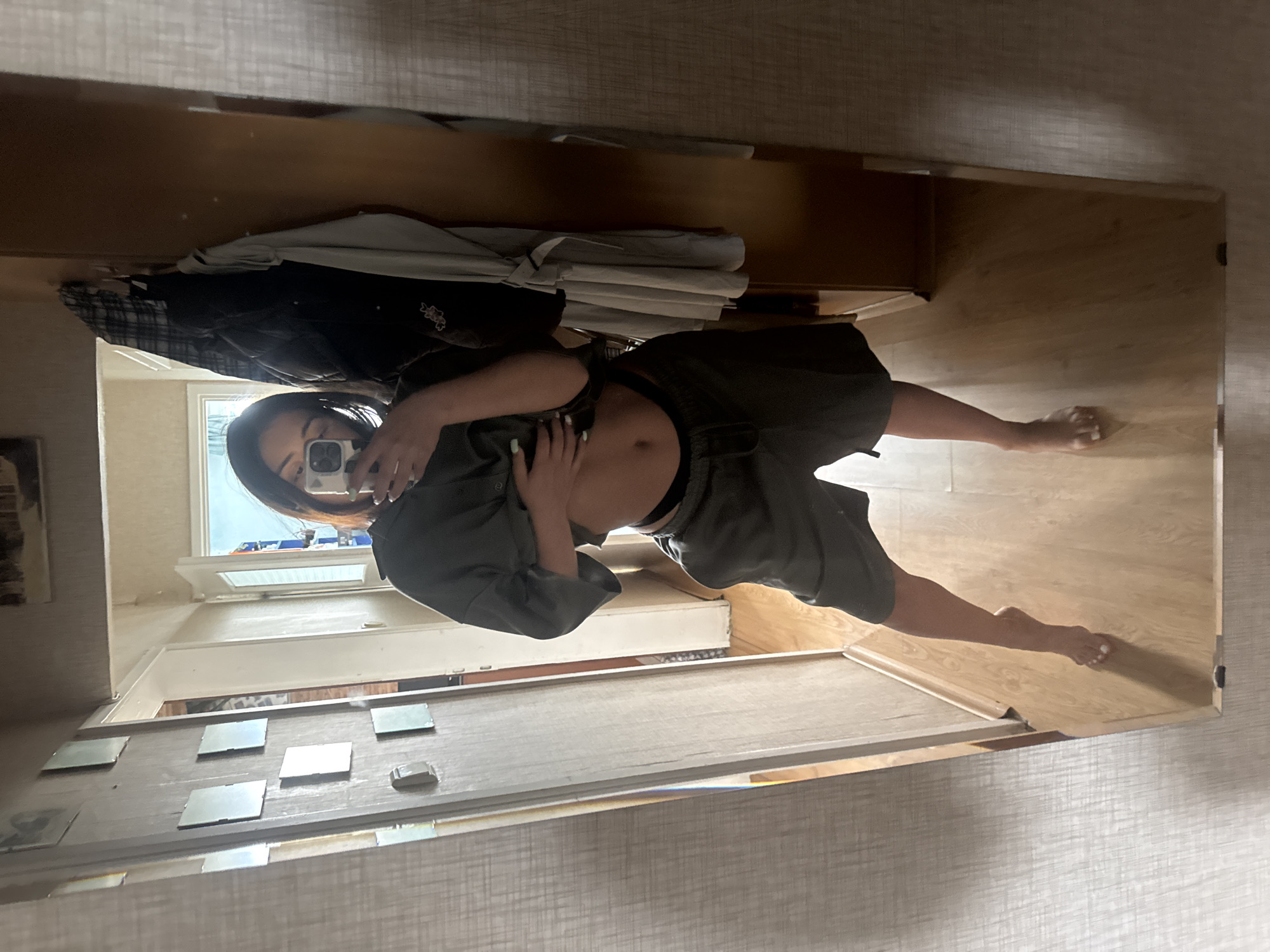 Person takes mirror selfies indoors in Sofia