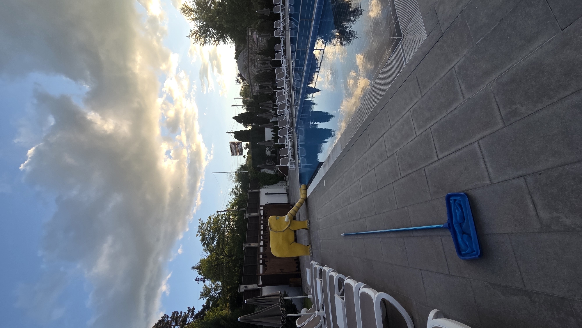 Evening pool area scene in Bania, Bulgaria