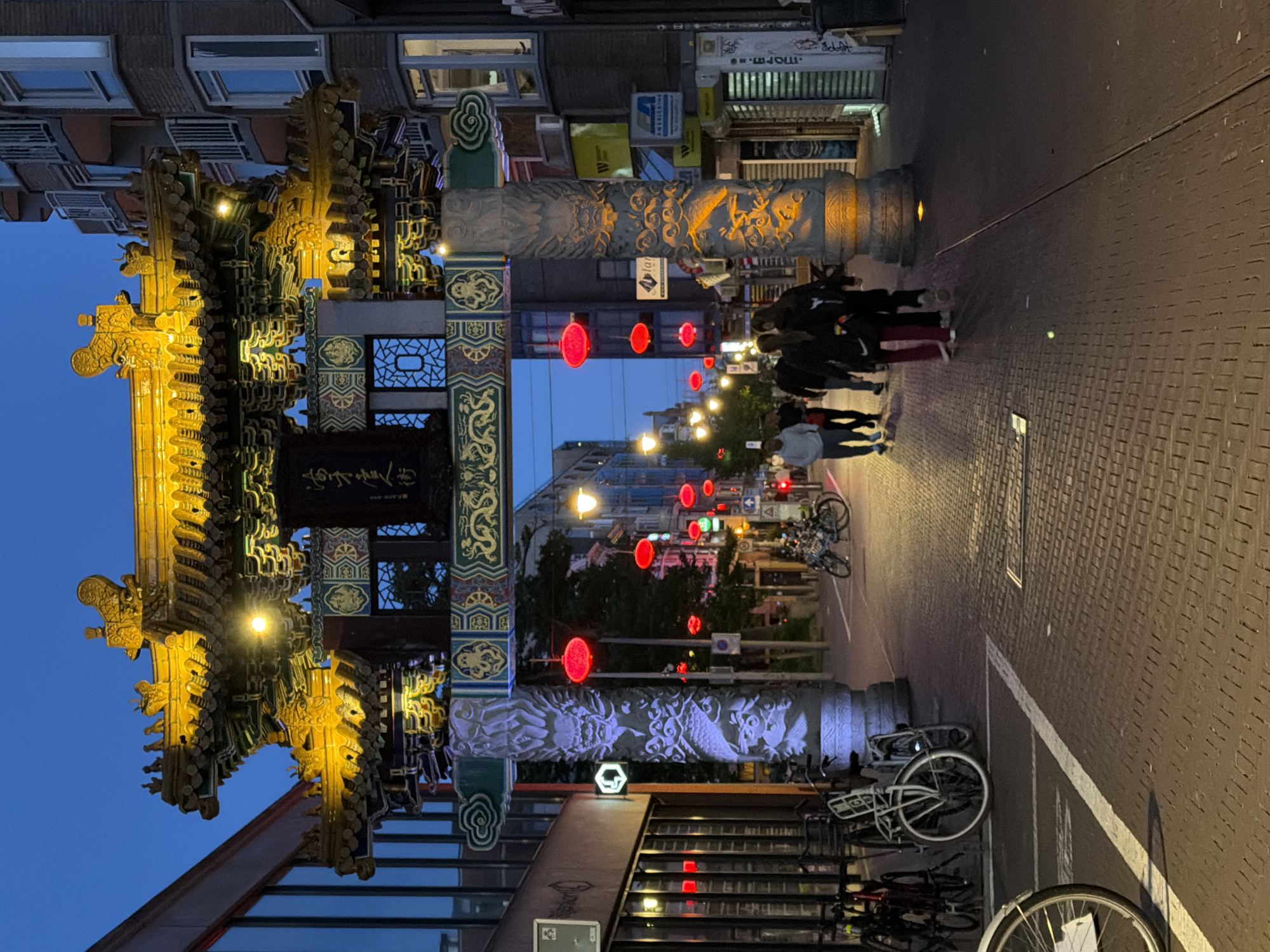 The Hague's Chinatown gate glows at dusk