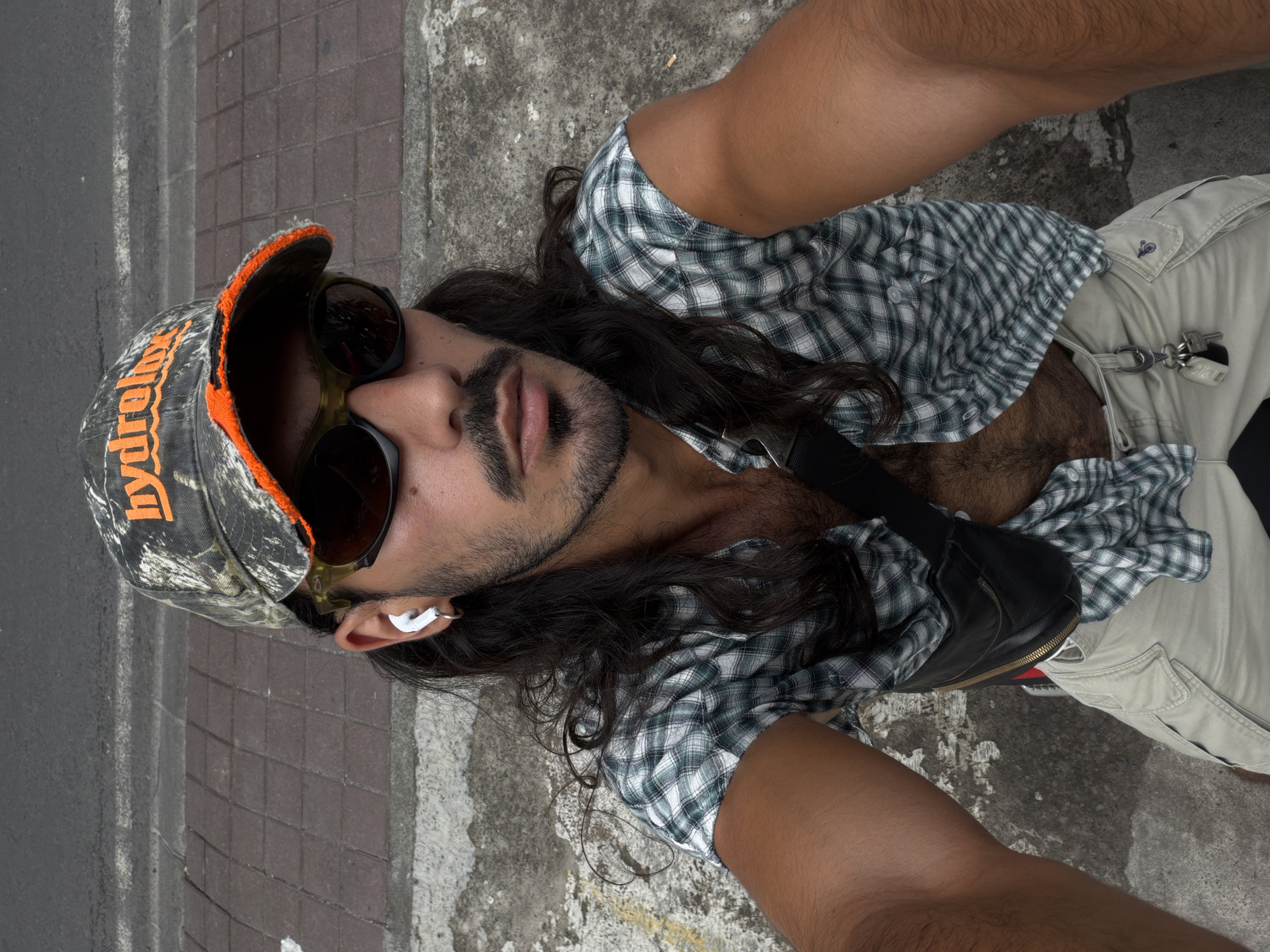 Bearded man in camouflage cap documented across North Kuta locations