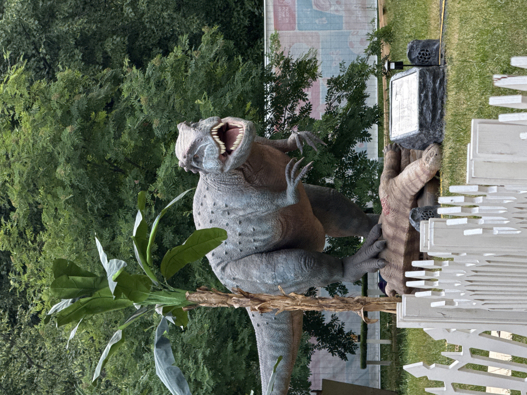 Moscow city scenes: dinosaur display, Soviet buildings, park sculpture