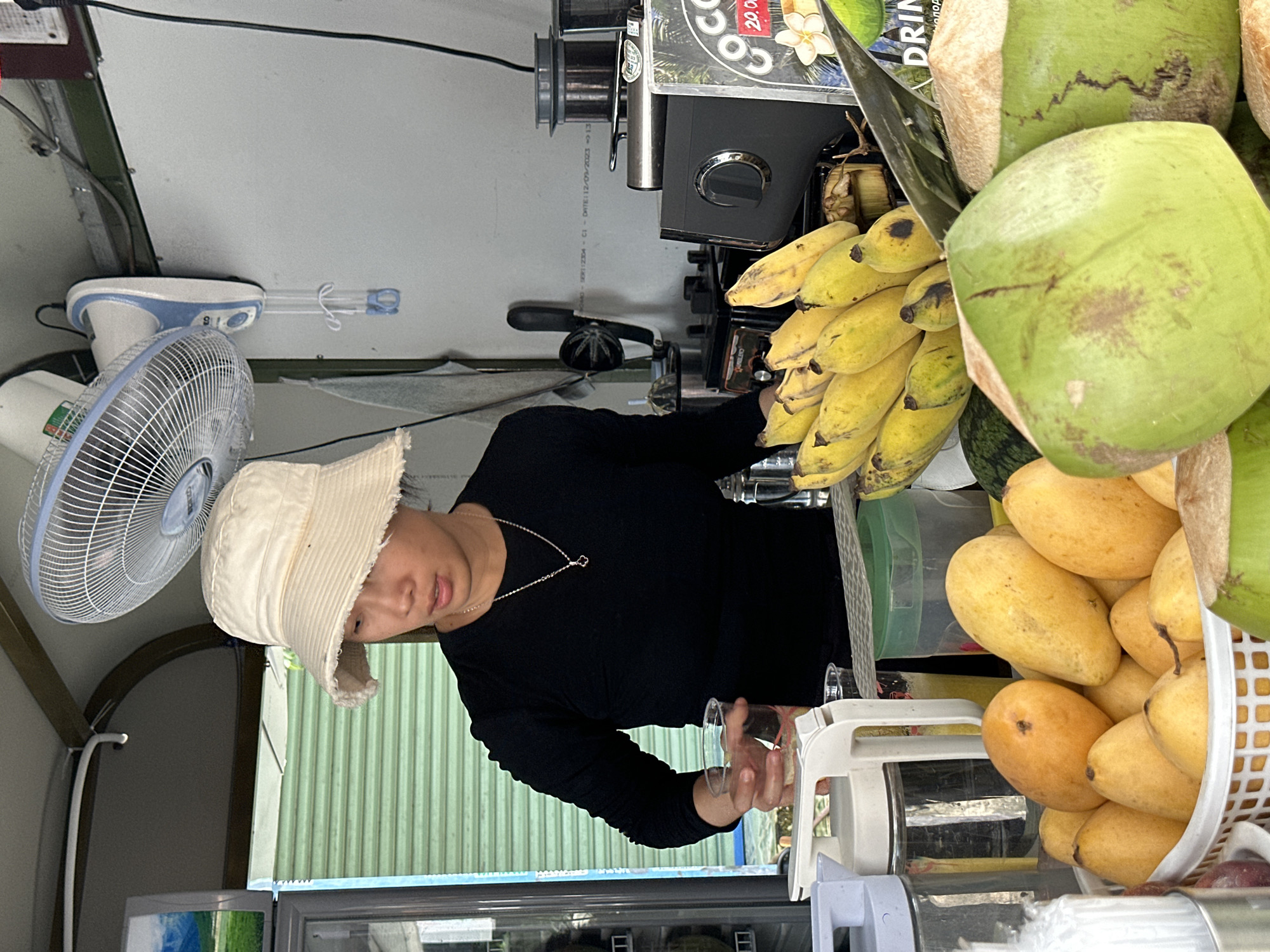Fresh coconut stall doing business in Phu Thuy Ward, Vietnam