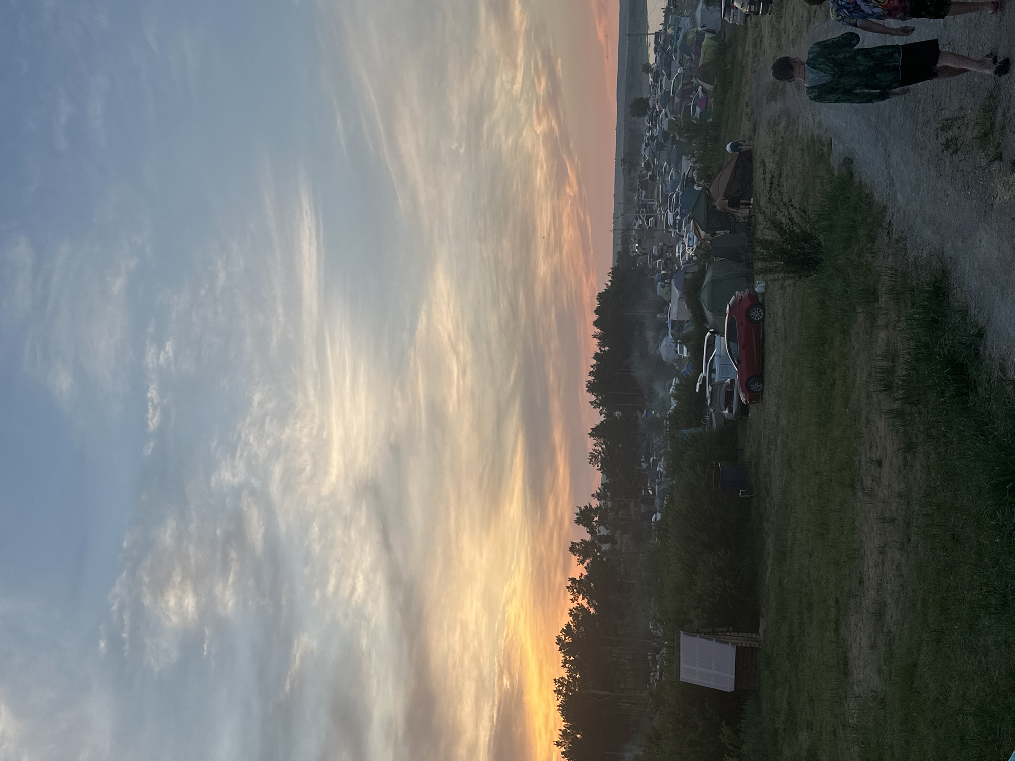 Lakeside campsite gathering at sunset, Zhemchuzhny, Russia