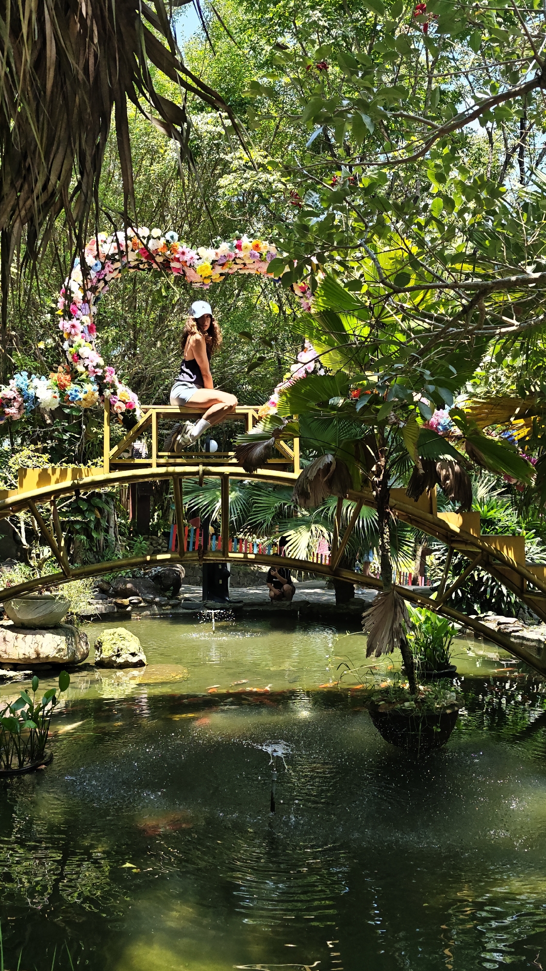 Tourist enjoys decorated bridge at Ba Na Hills Vietnam