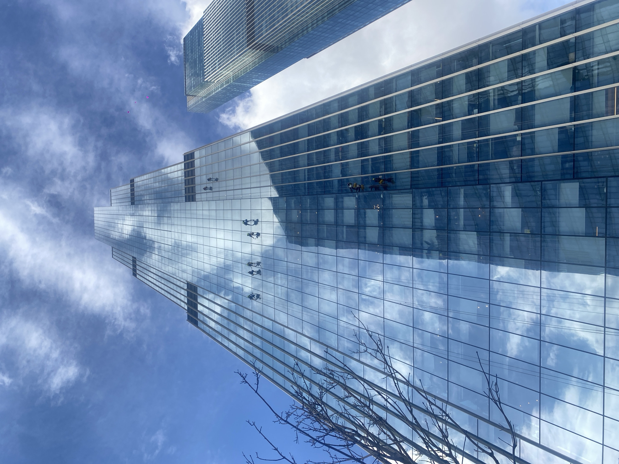 Window washers clean skyscraper facade in Khimki, Russia