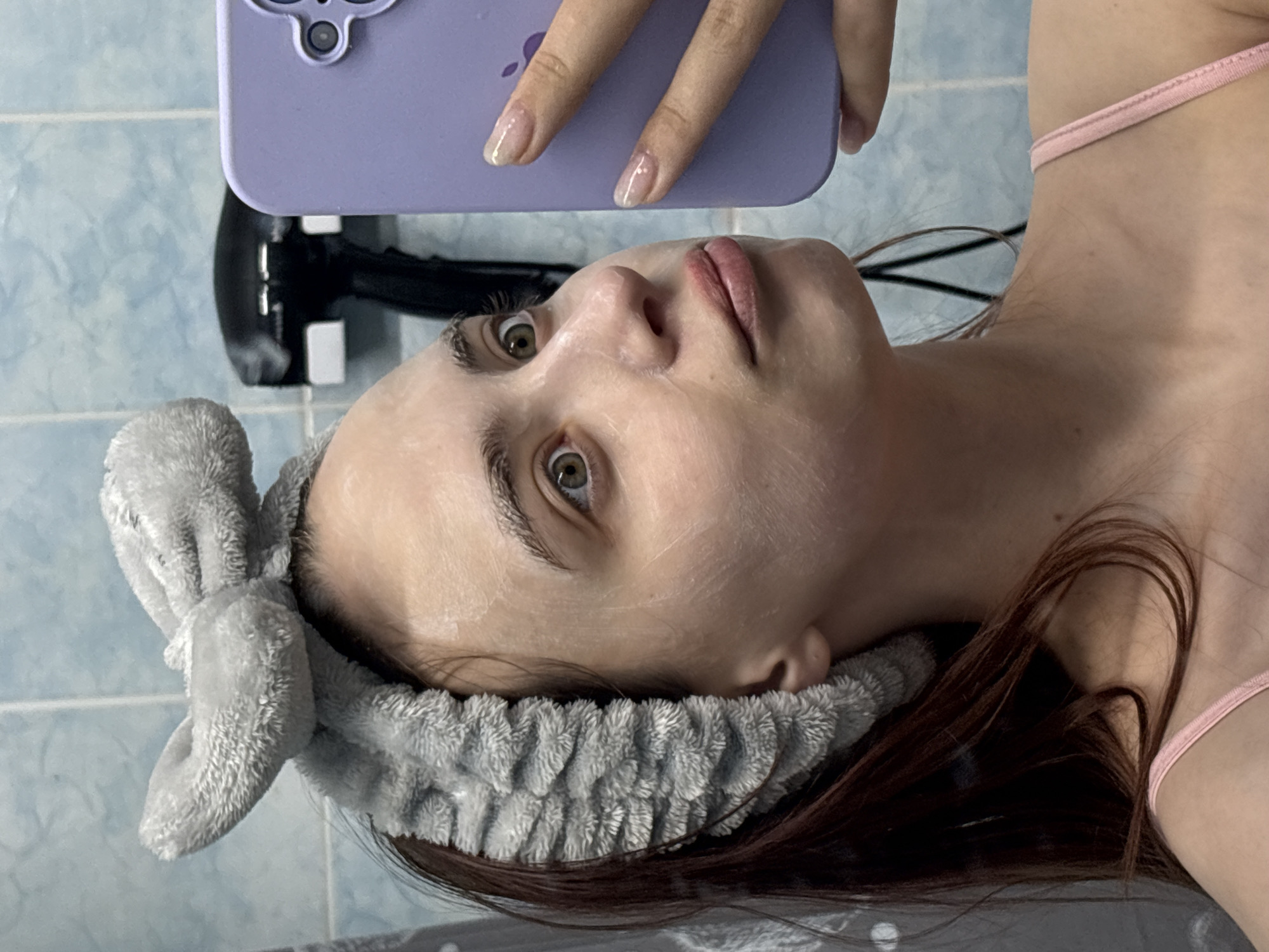 Evening skincare routine and pet moments in Russian home