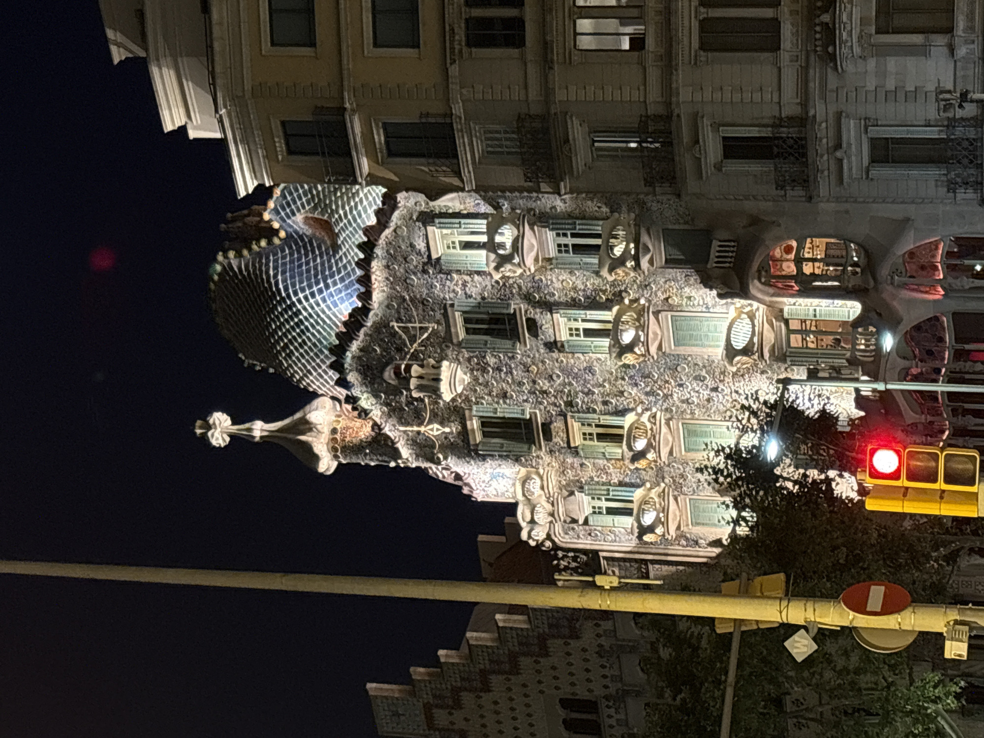 Casa Batlló glowing at night on Passeig de Gràcia
