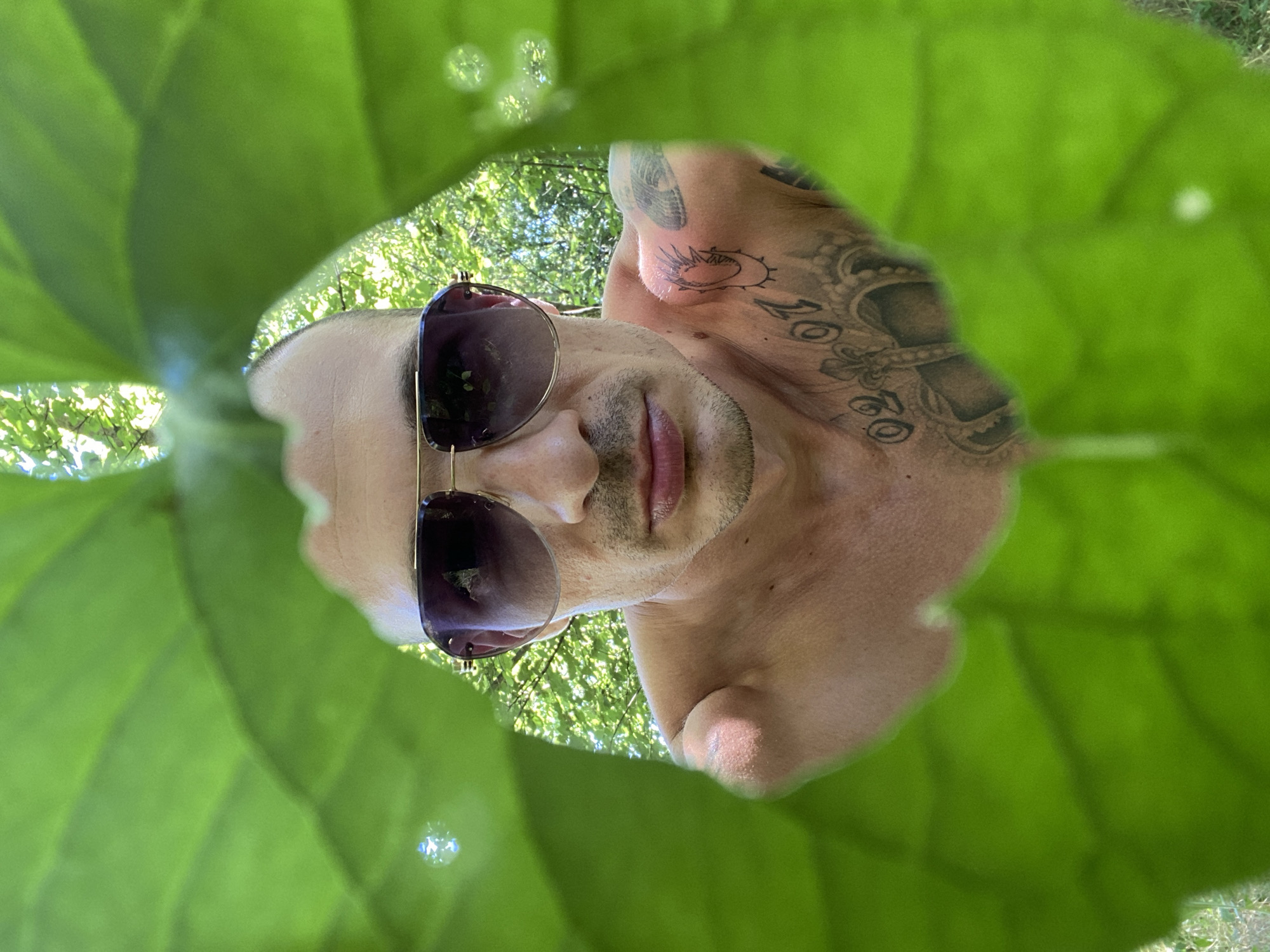 Man poses for outdoor photo session in Pleven park