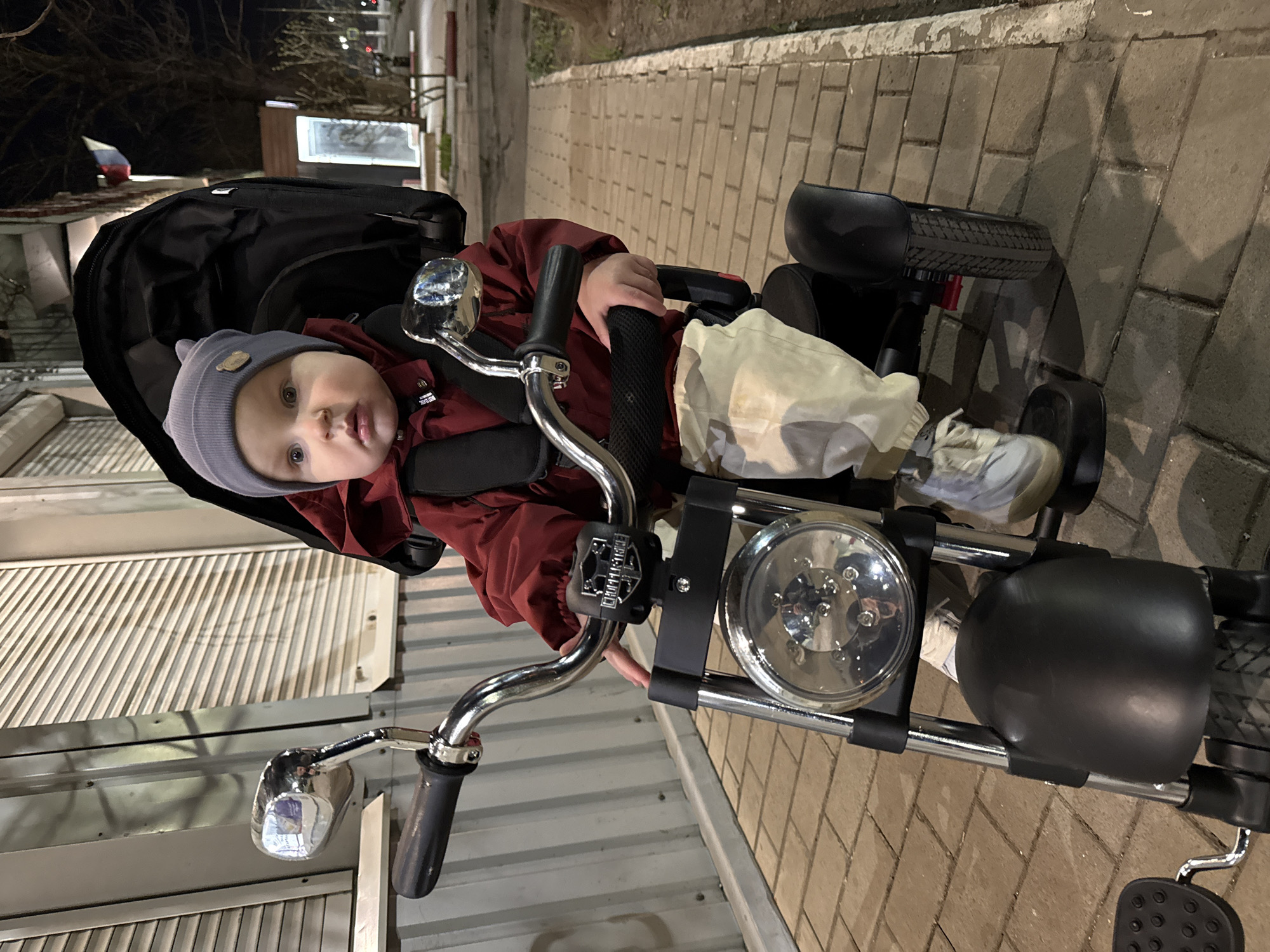 Baby in tricycle spotted on Donetsk street