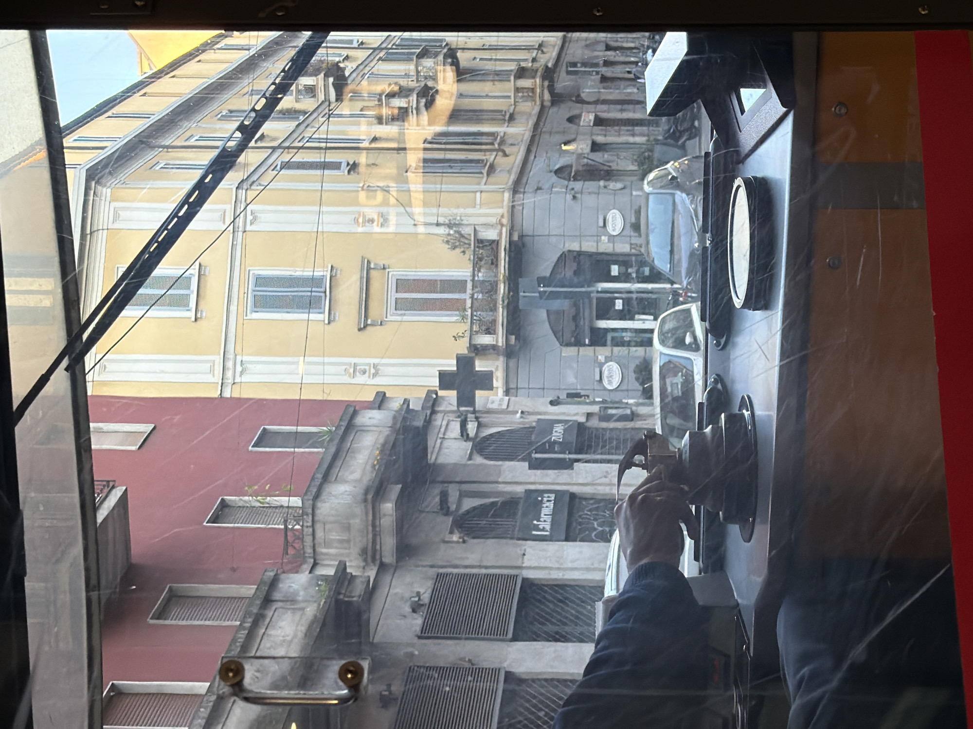 Early morning tram journey through Milan streets captured