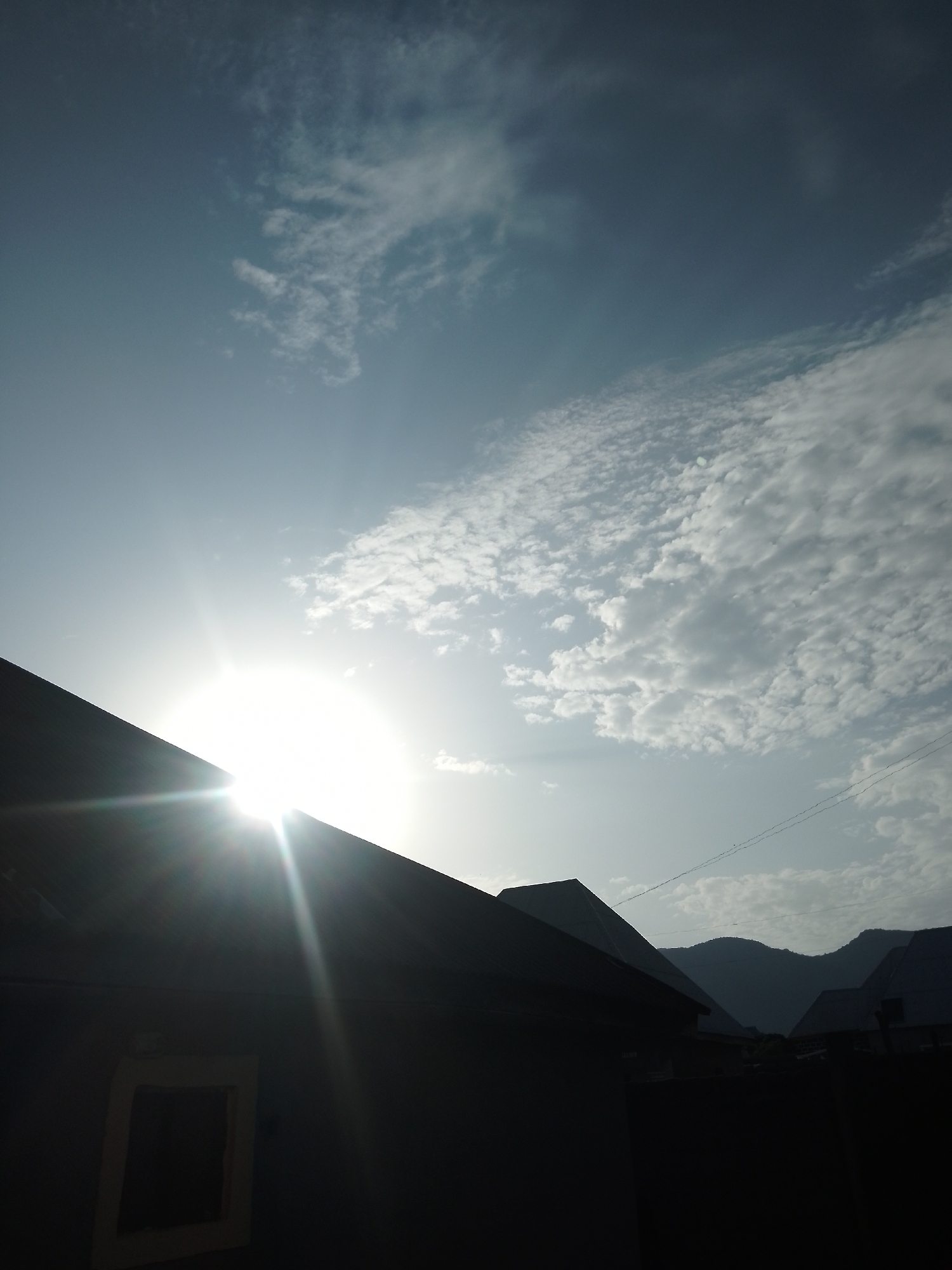 Scattered rural scenes: soccer, scrubland, trucks, and worn infrastructure