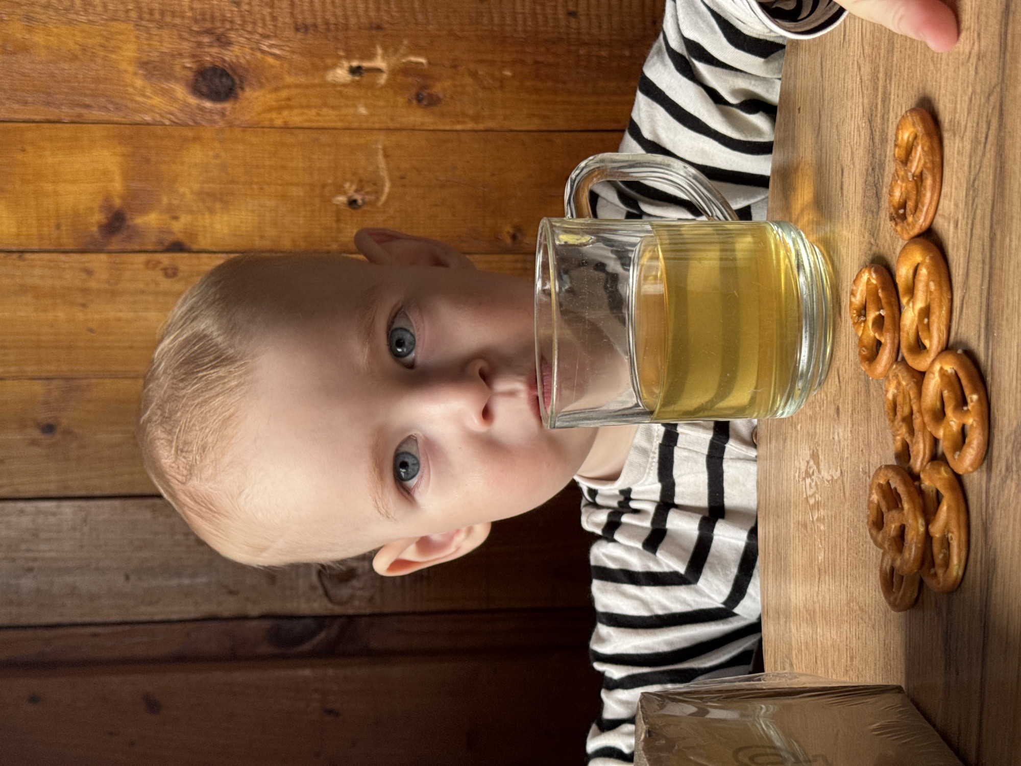 Toddler enjoys late-night snack in rural Russian village