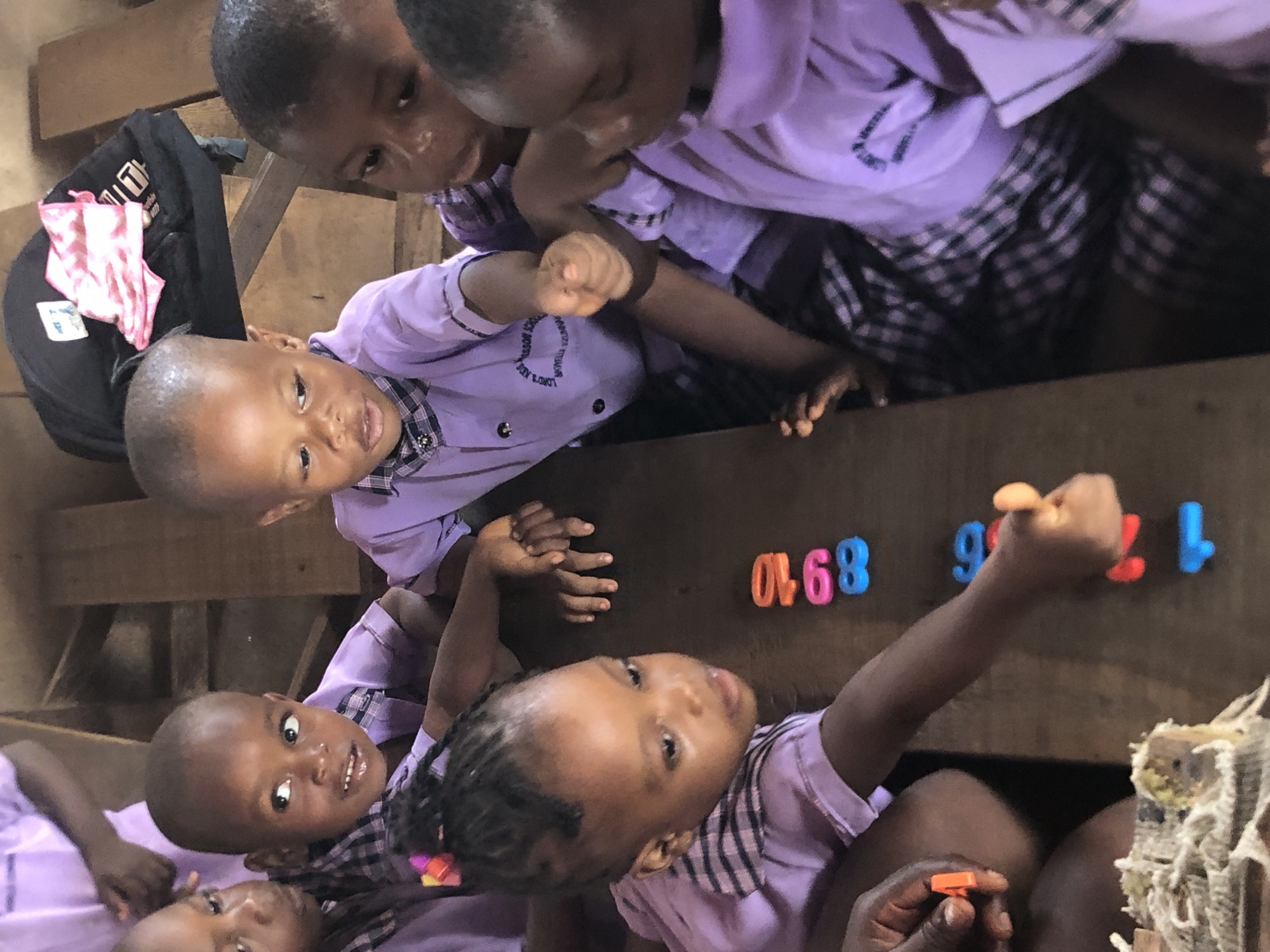 Primary school students attend morning classes in Ukwu-Abwa, Nigeria