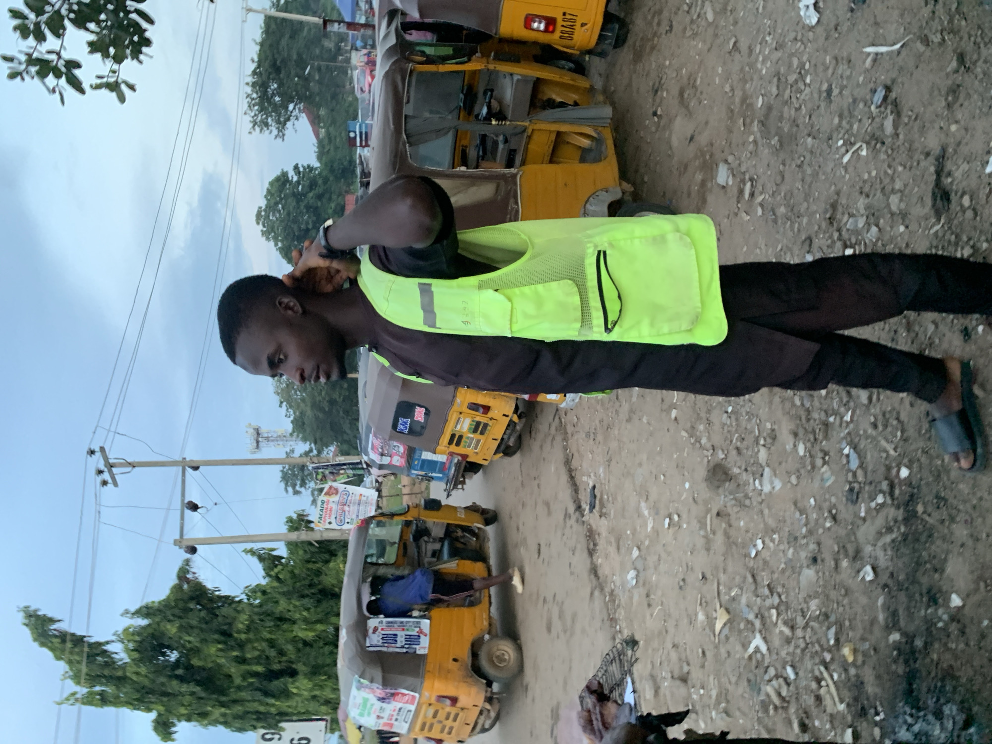 Evening street activity at a roadside market in Abuja