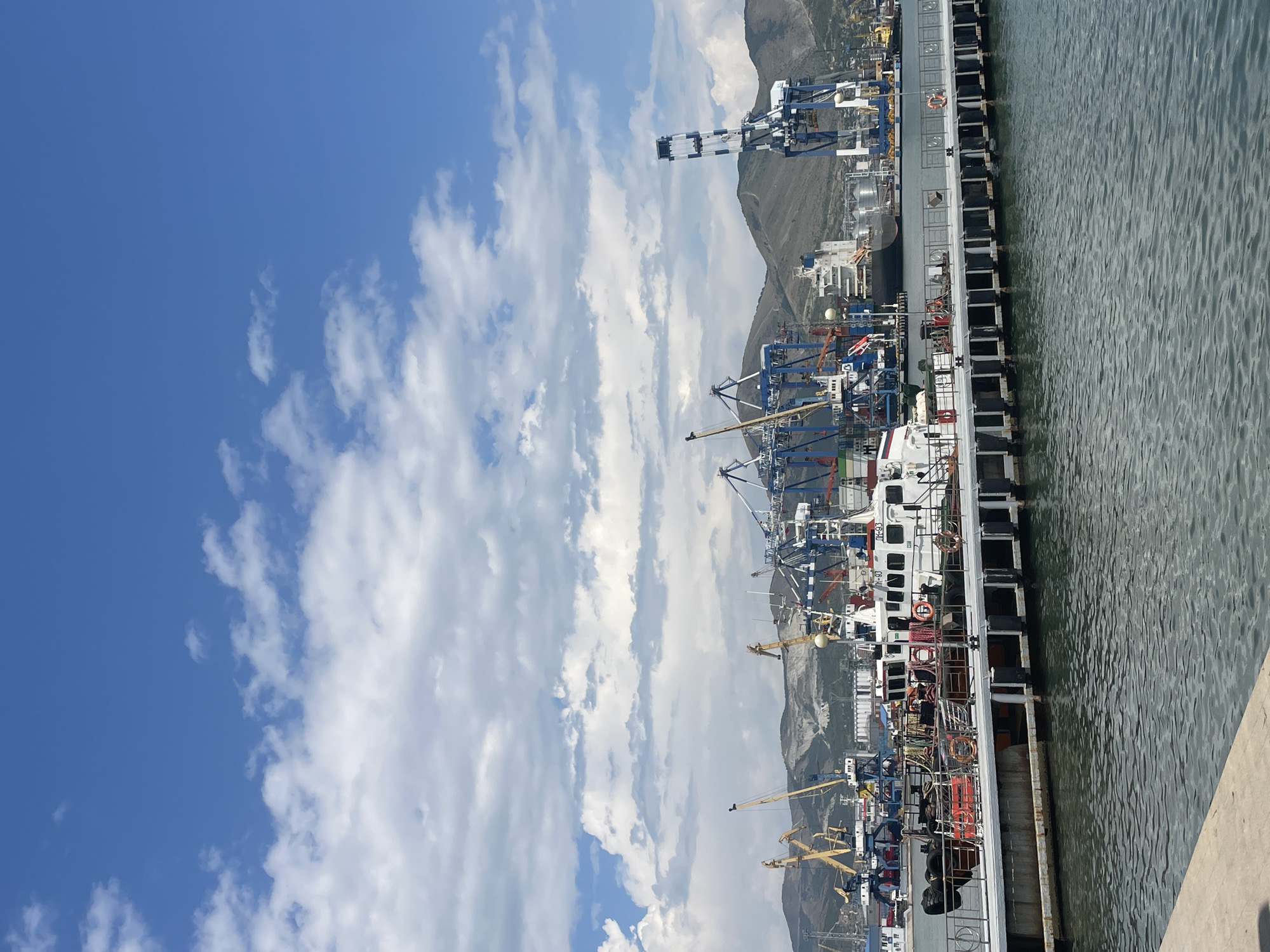 Civilian and military vessels side by side at Novorossiysk port