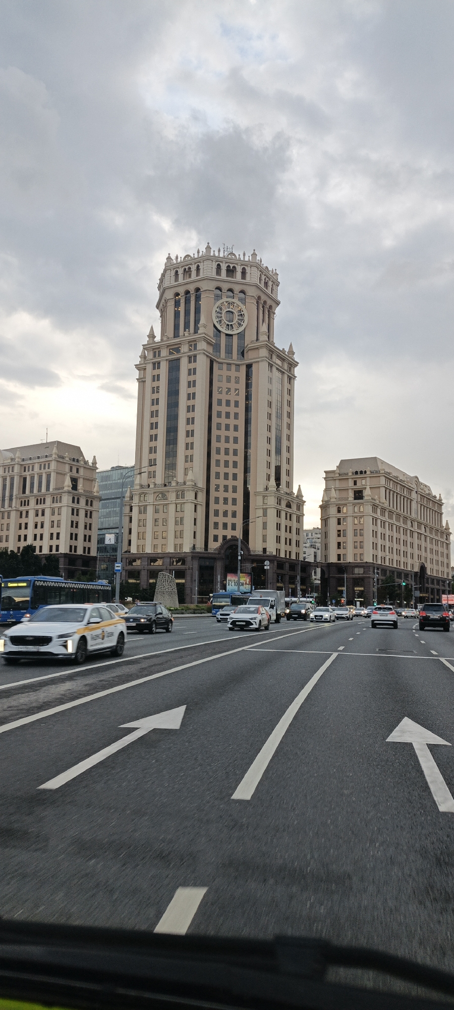 Low-angle street view under overcast skies