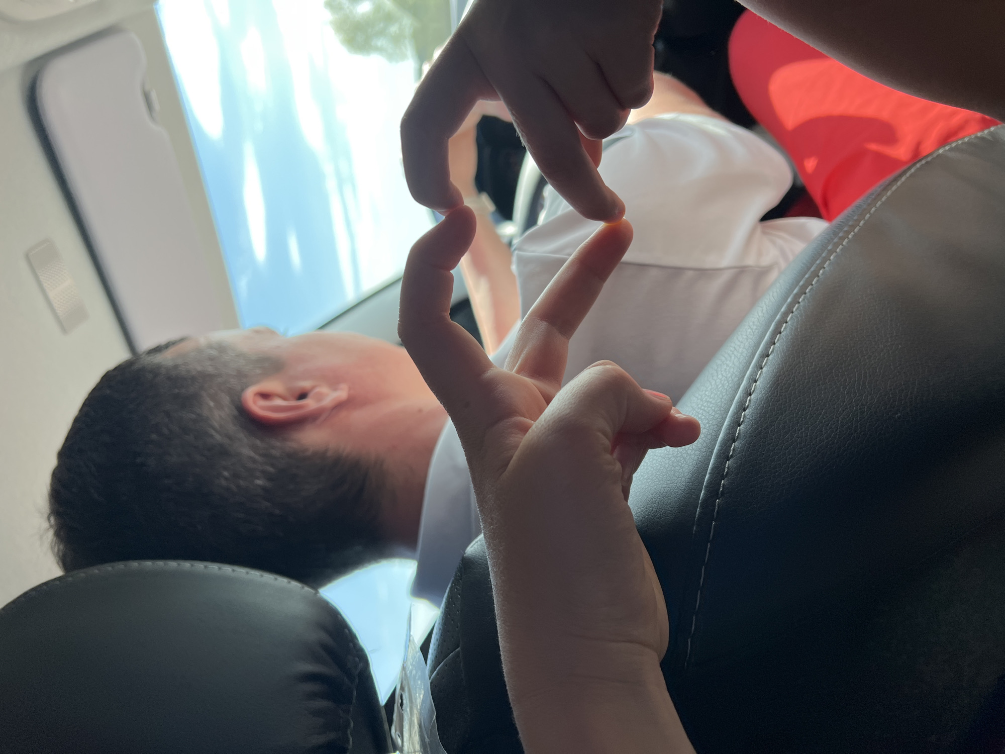 Intimate moment captured between couple in vehicle in Niva