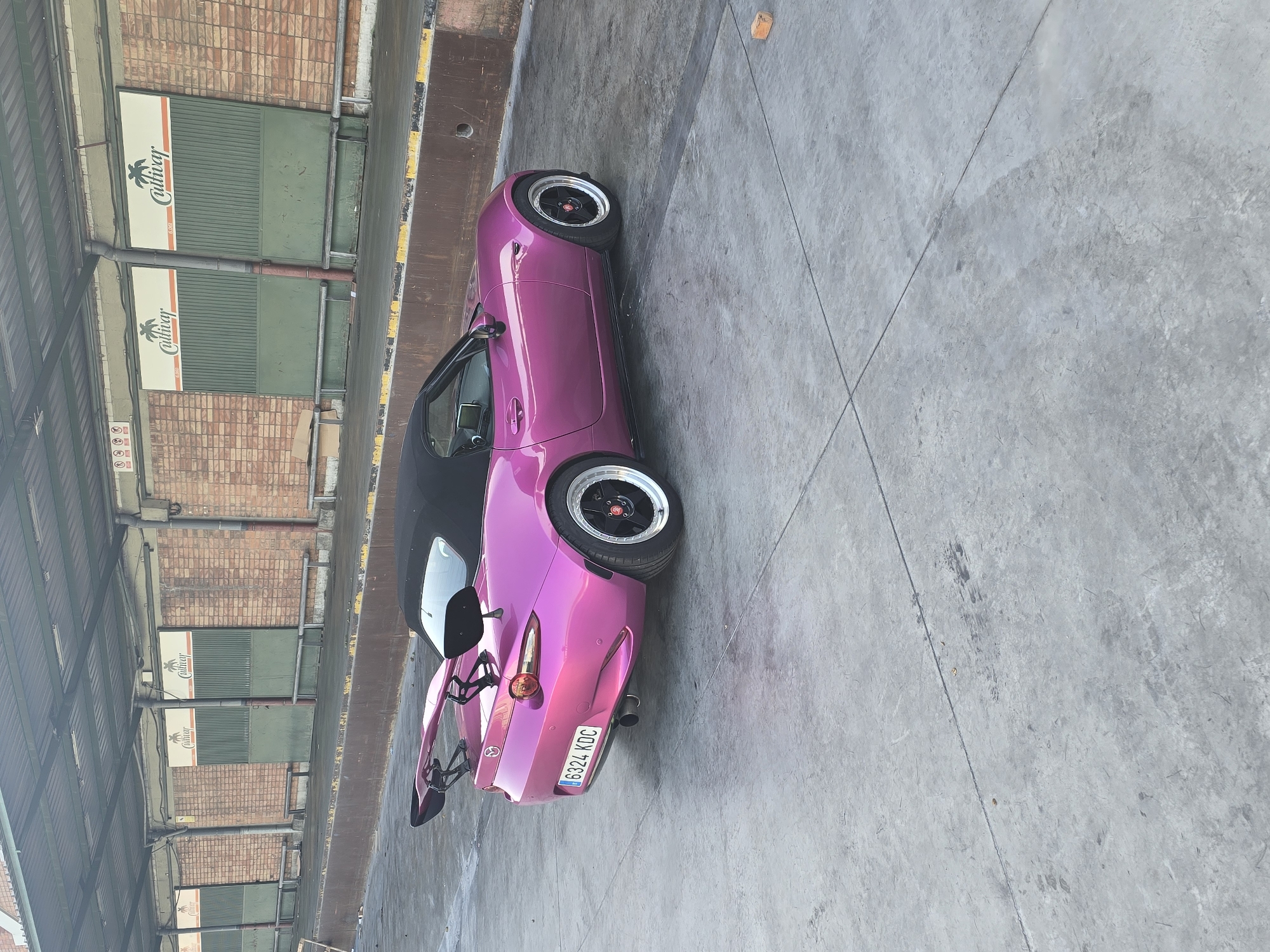 Pink convertible sports car spotted parked in Barcelona